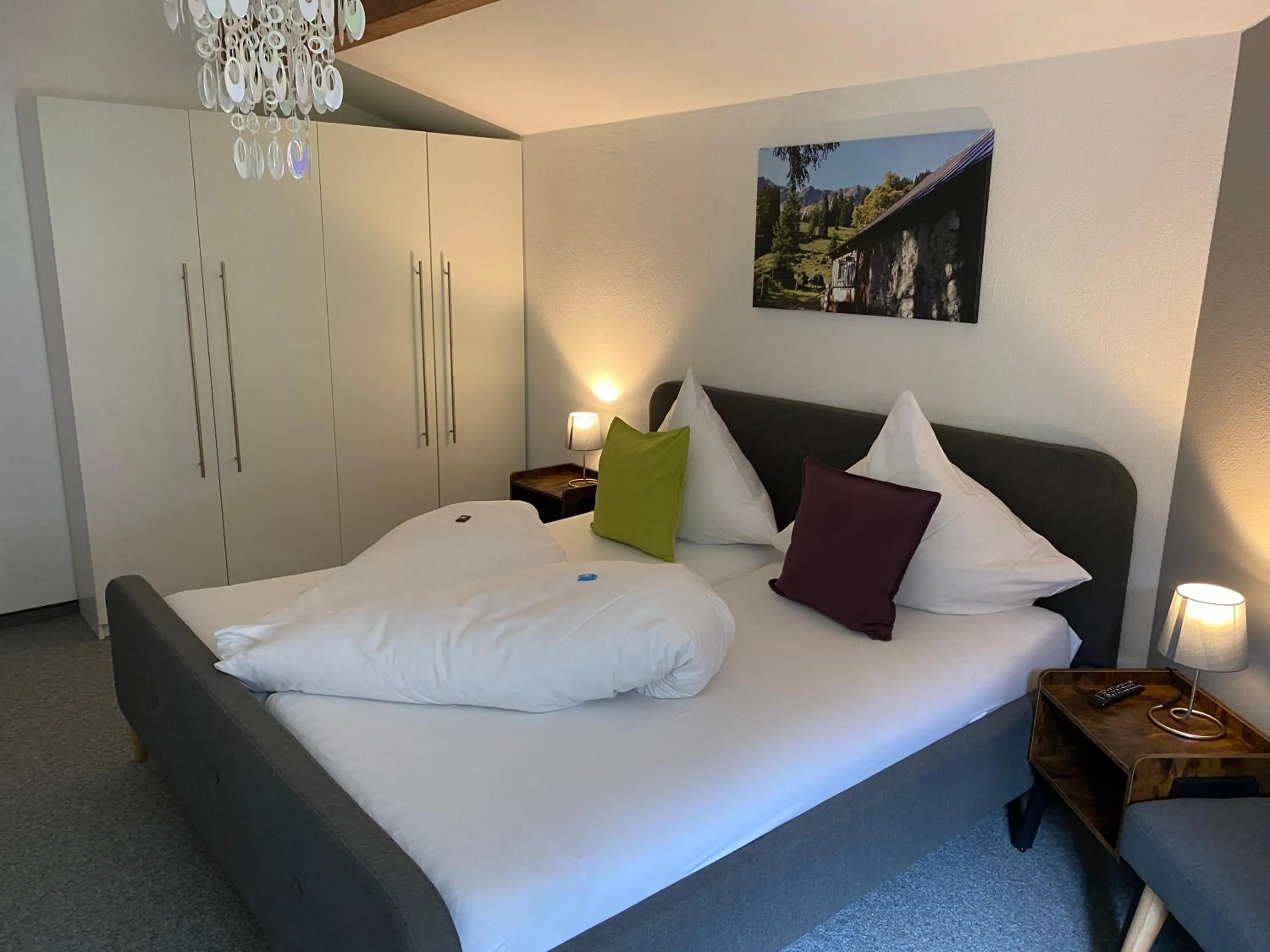 Bed in Grüner Hut - DEIN BERGHOTEL