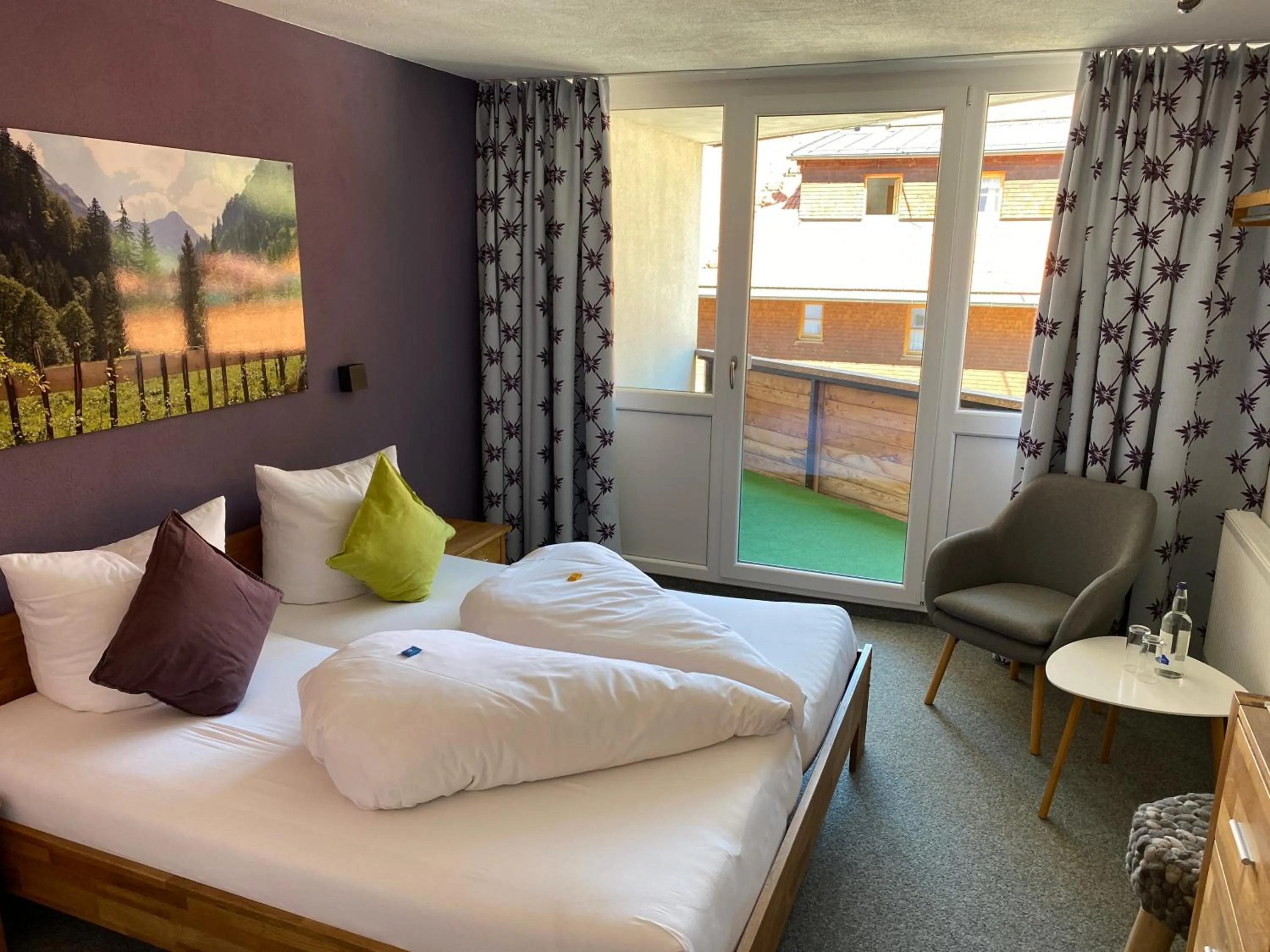 Bed in Grüner Hut - DEIN BERGHOTEL