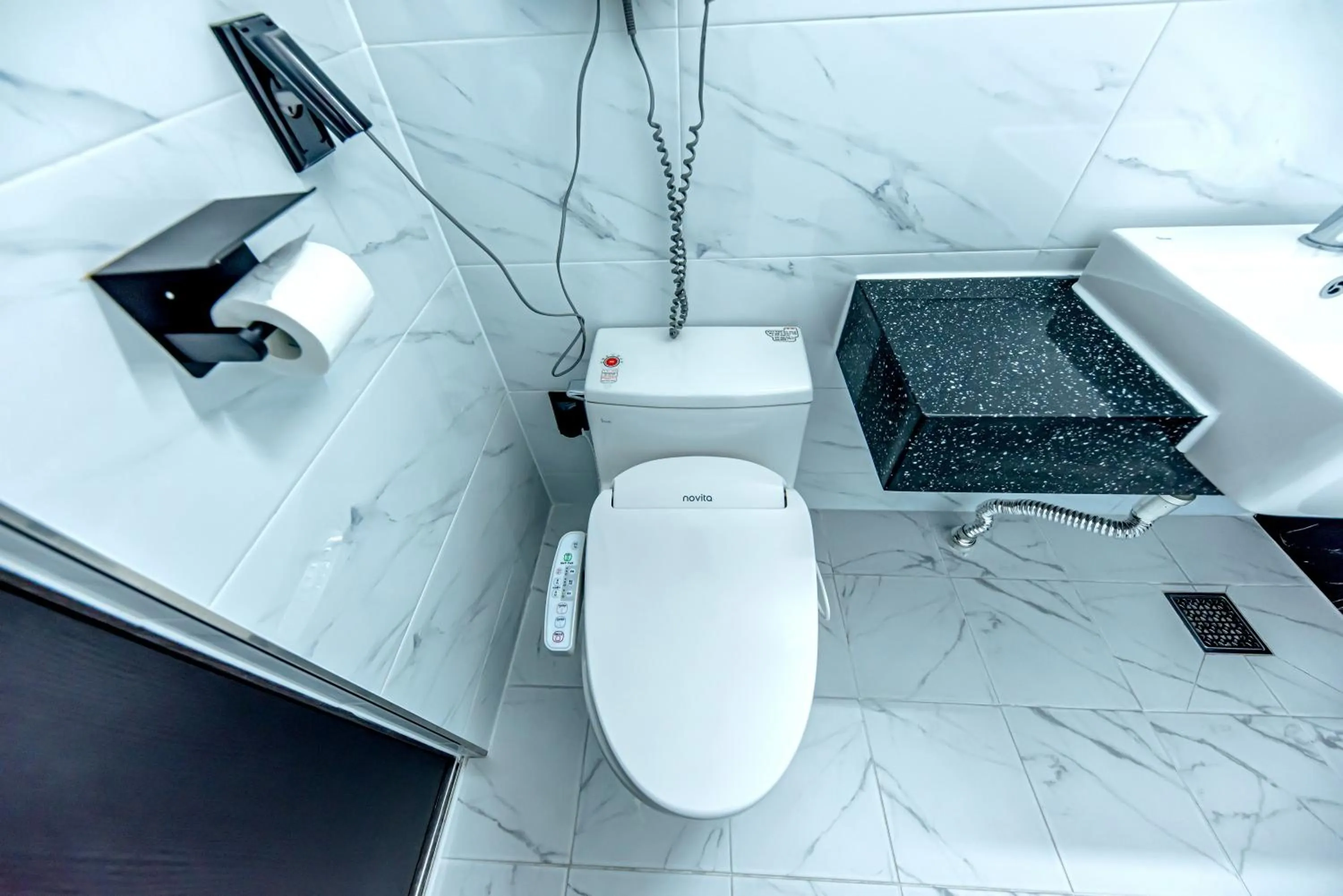 Bathroom in HS Tourist Hotel