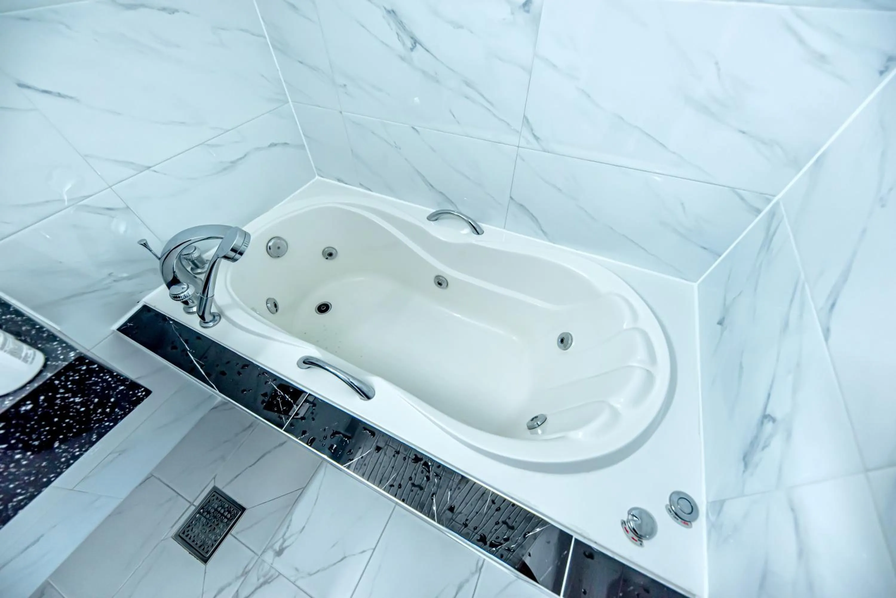 Bathroom in HS Tourist Hotel