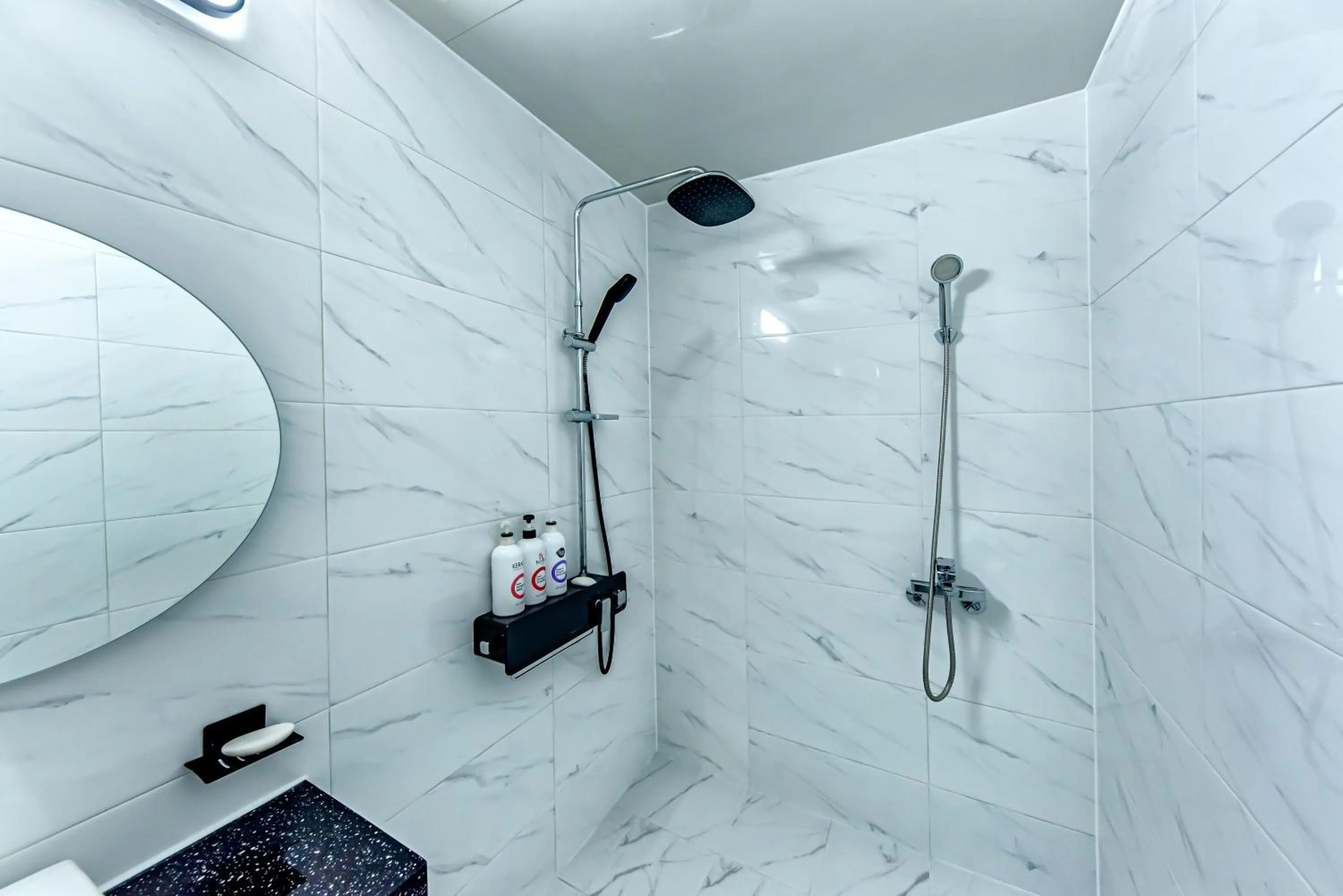 Bathroom in HS Tourist Hotel