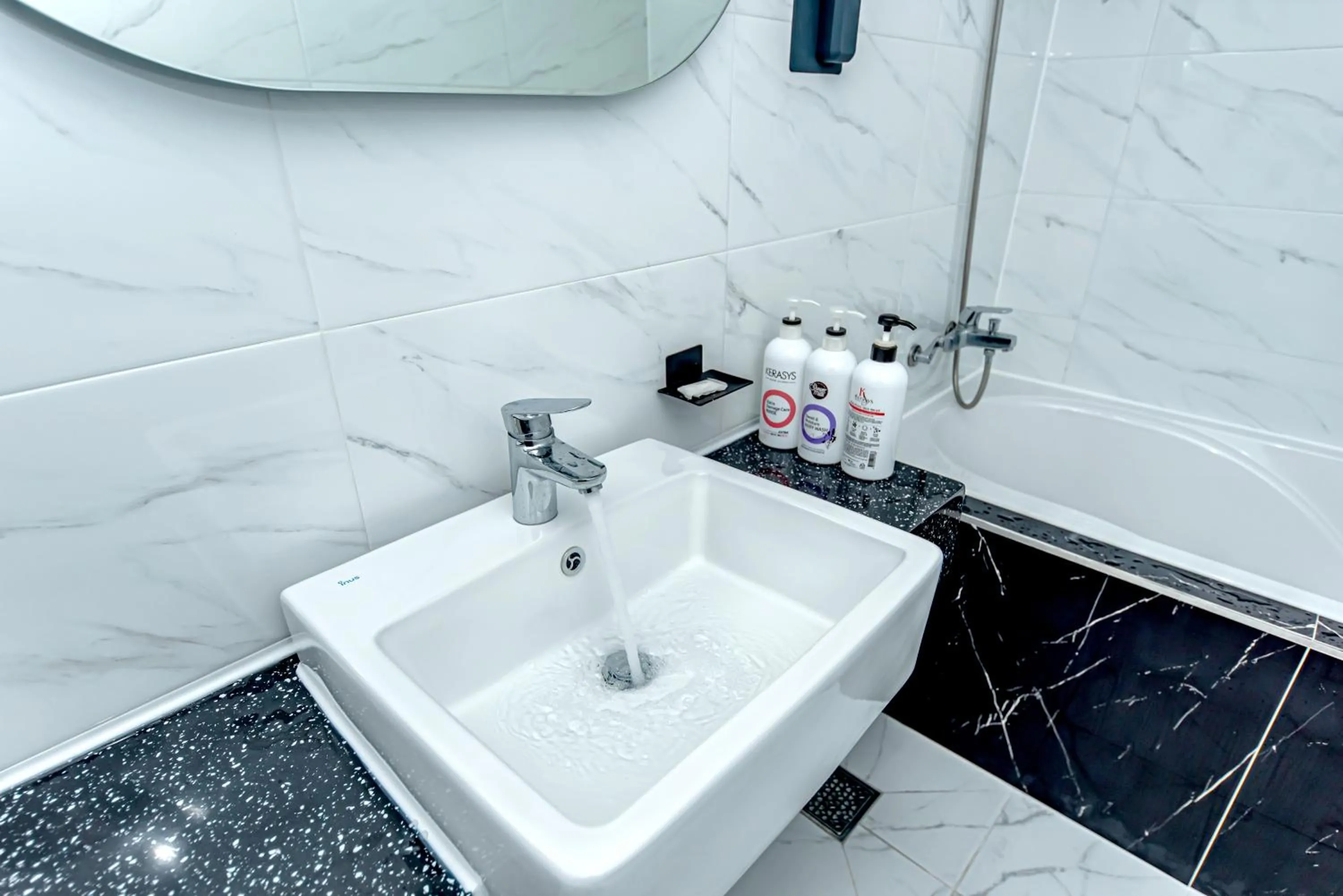 Bathroom in HS Tourist Hotel