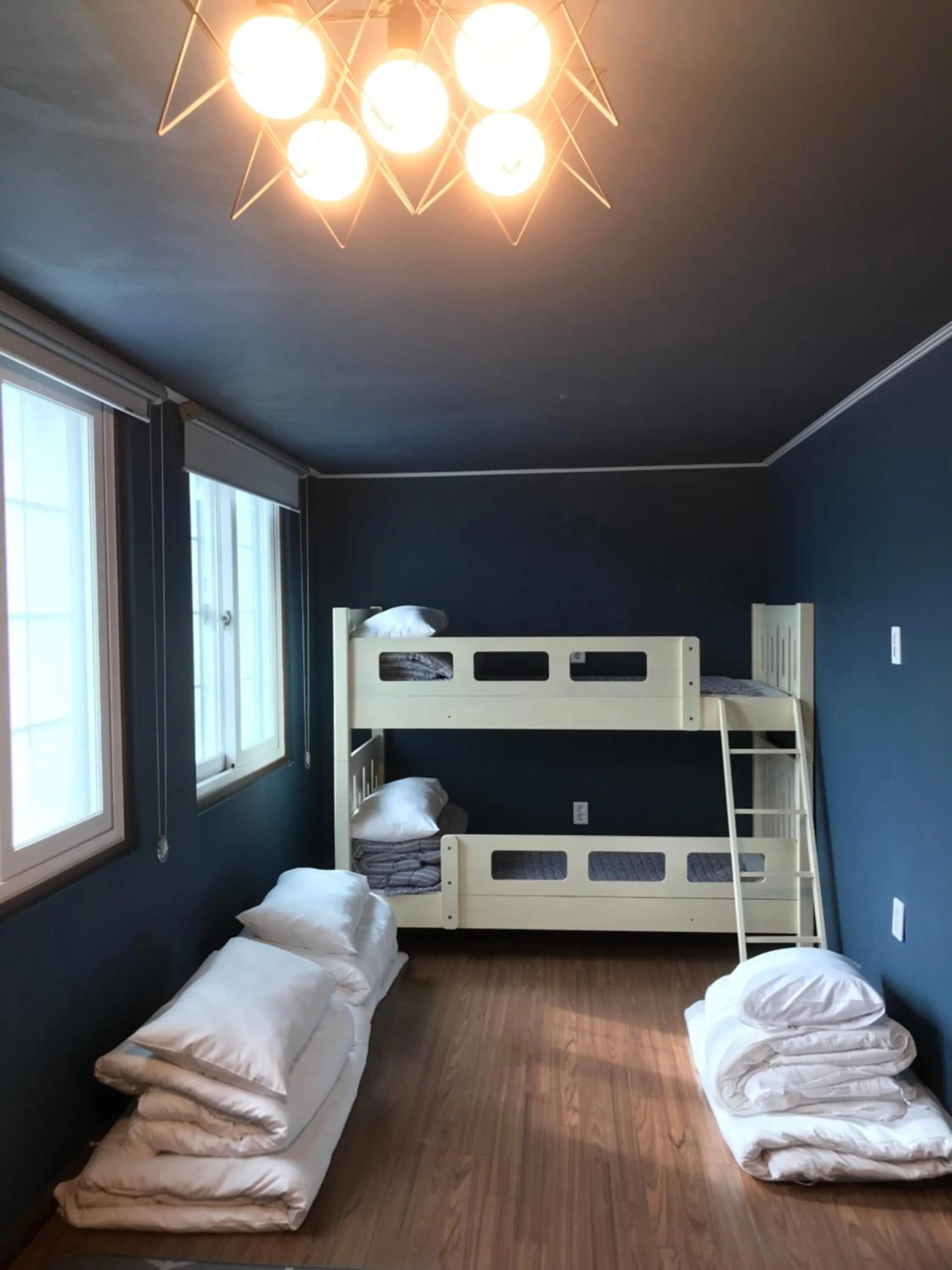 Bed in Grim Garden Guesthouse