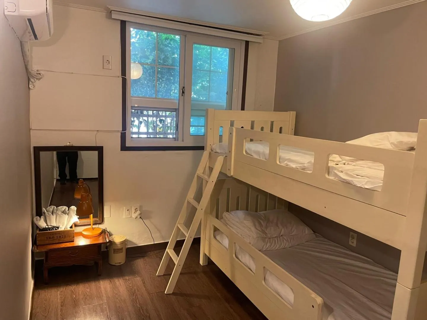 Bed in Grim Garden Guesthouse