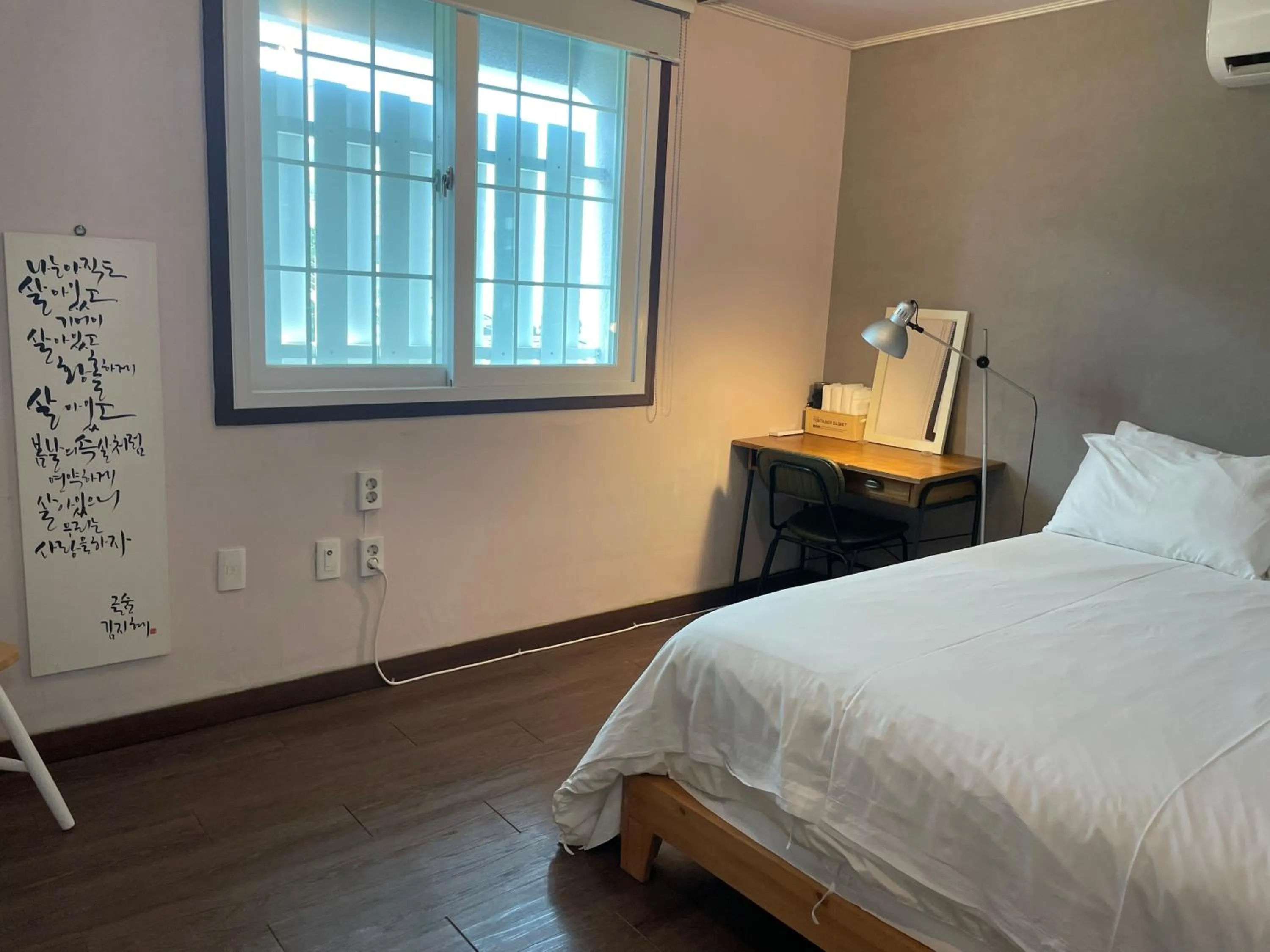 Bed in Grim Garden Guesthouse