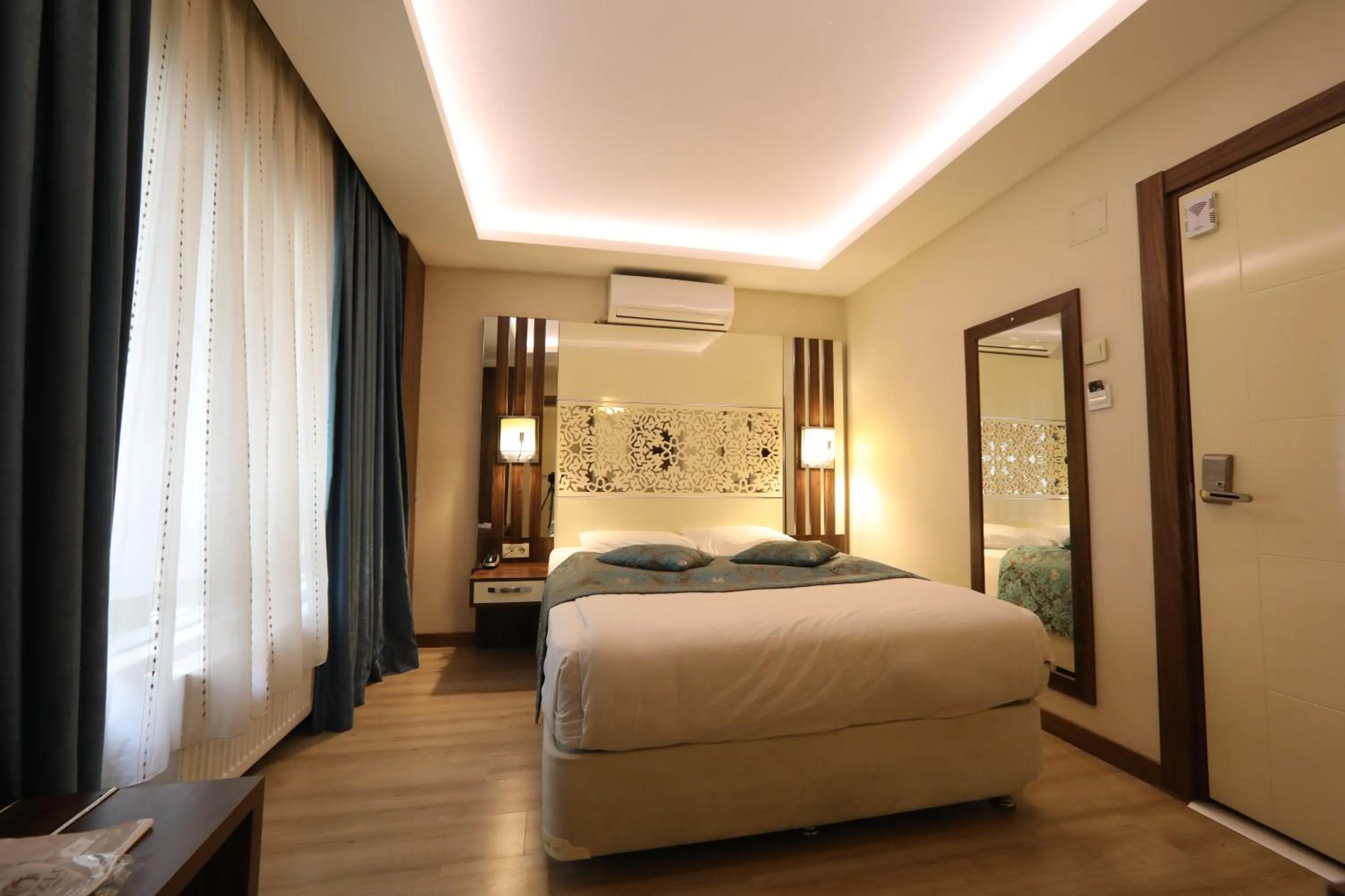 Bed in Rest Inn Aydın Hotel