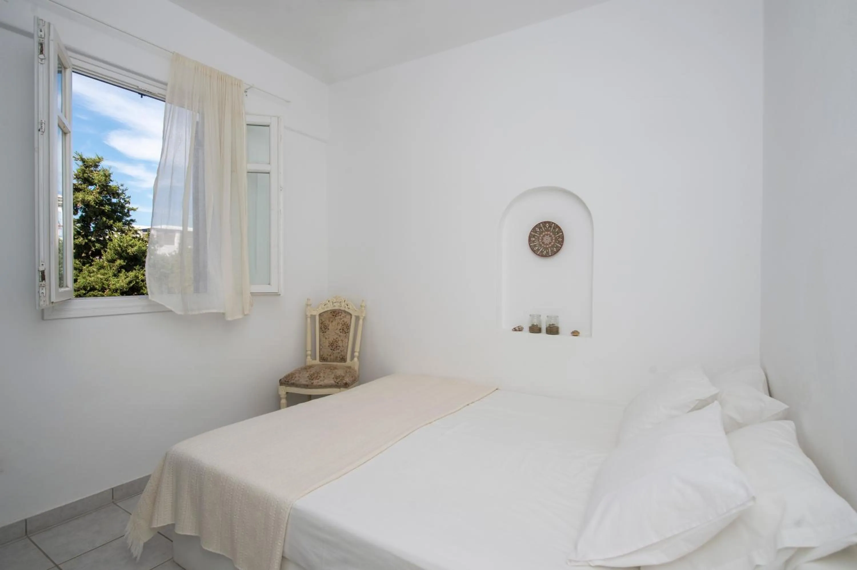 Photo of the whole room, Bed in Cleopatra Seaside Homes, Logaras, Paros