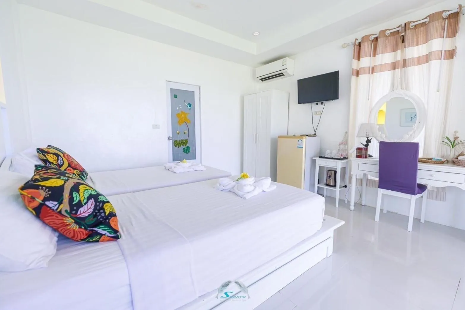 Bed in Suanya Kohkood Resort and Spa