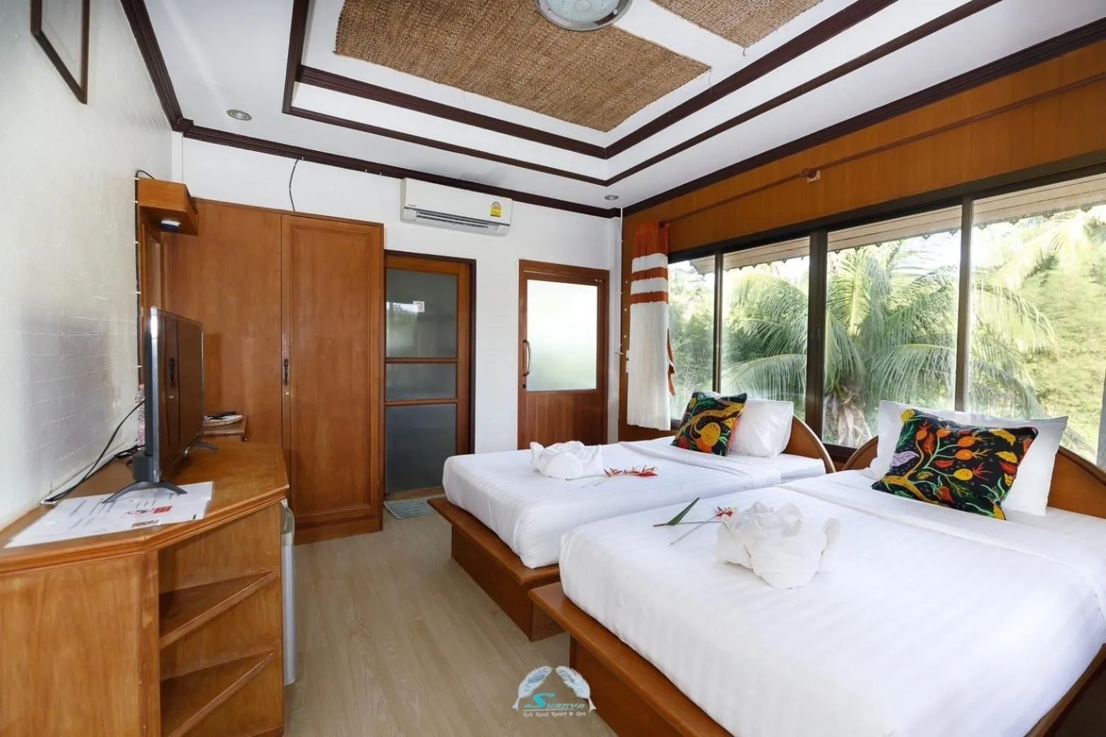 Bed in Suanya Kohkood Resort and Spa