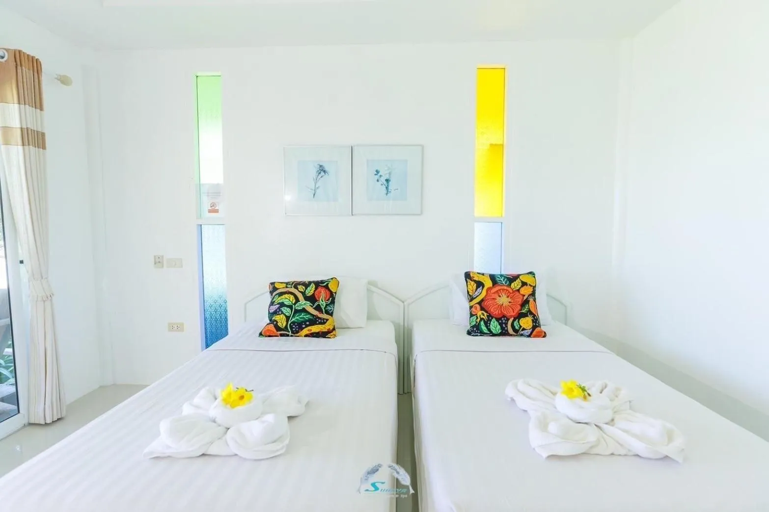 Bed in Suanya Kohkood Resort and Spa