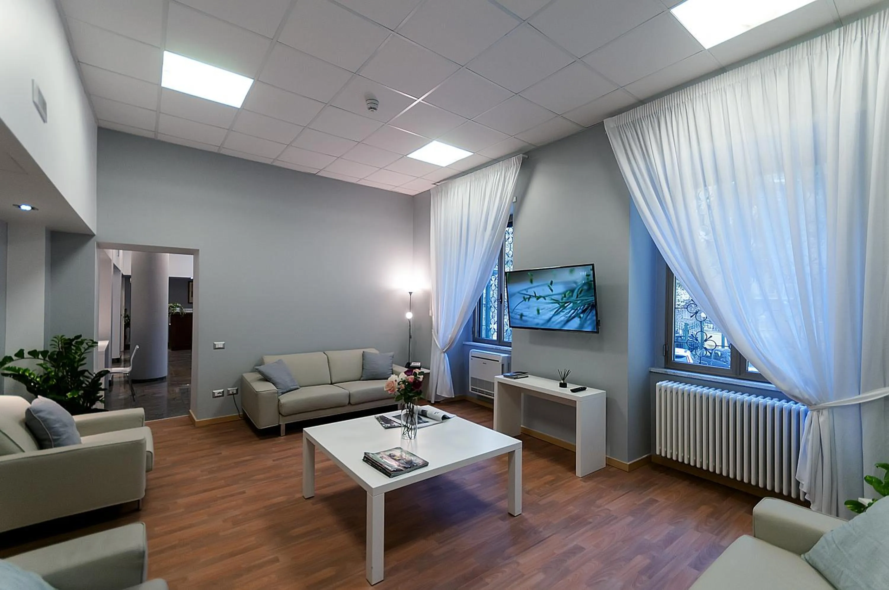 Communal lounge/ TV room in Villa Albina