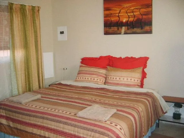 Bed in All Are Welcome Guest House