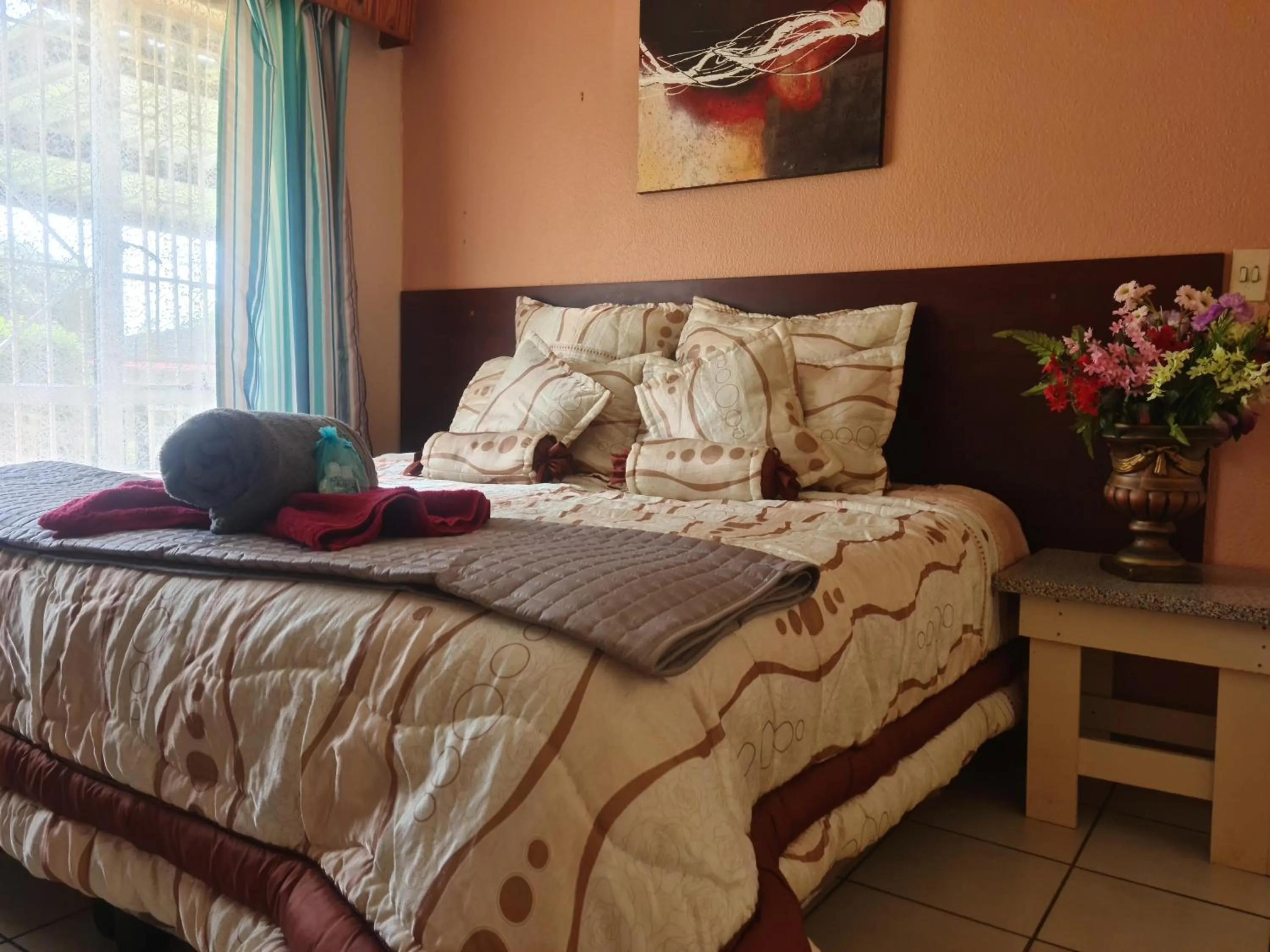 Bed in All Are Welcome Guest House