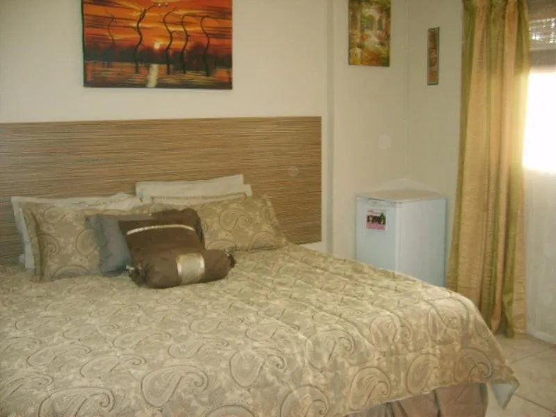 Bed in All Are Welcome Guest House