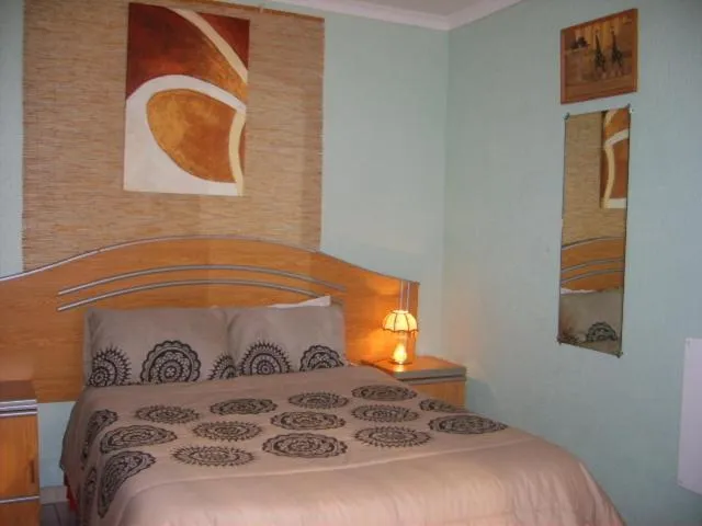 Bed in All Are Welcome Guest House