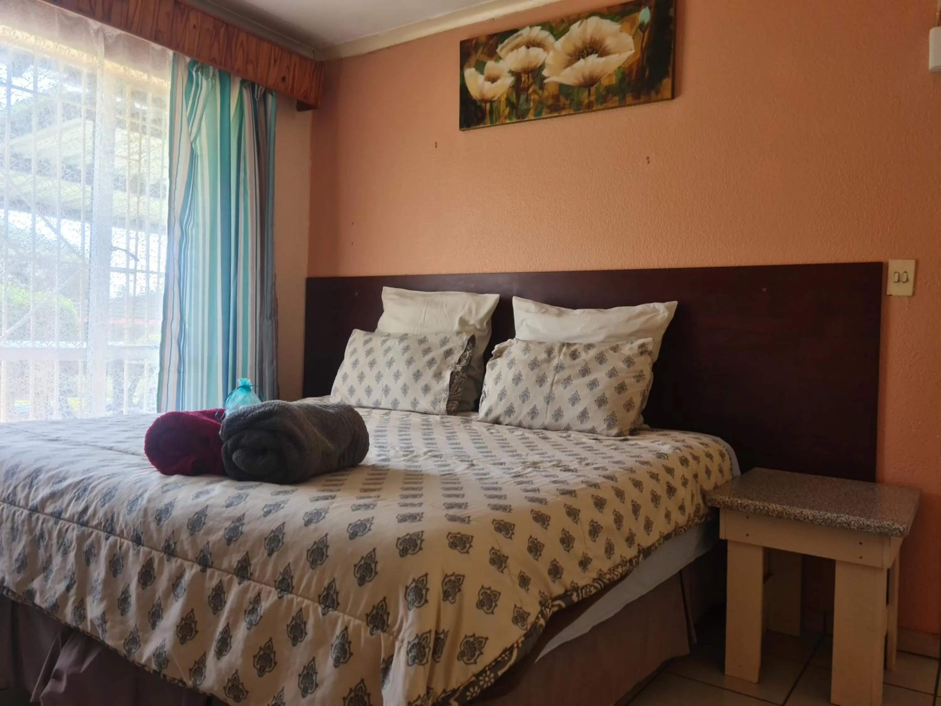 Bed in All Are Welcome Guest House