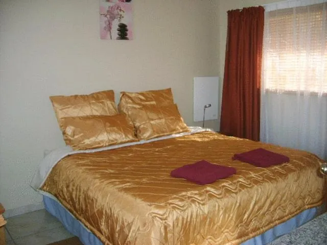 Bed in All Are Welcome Guest House