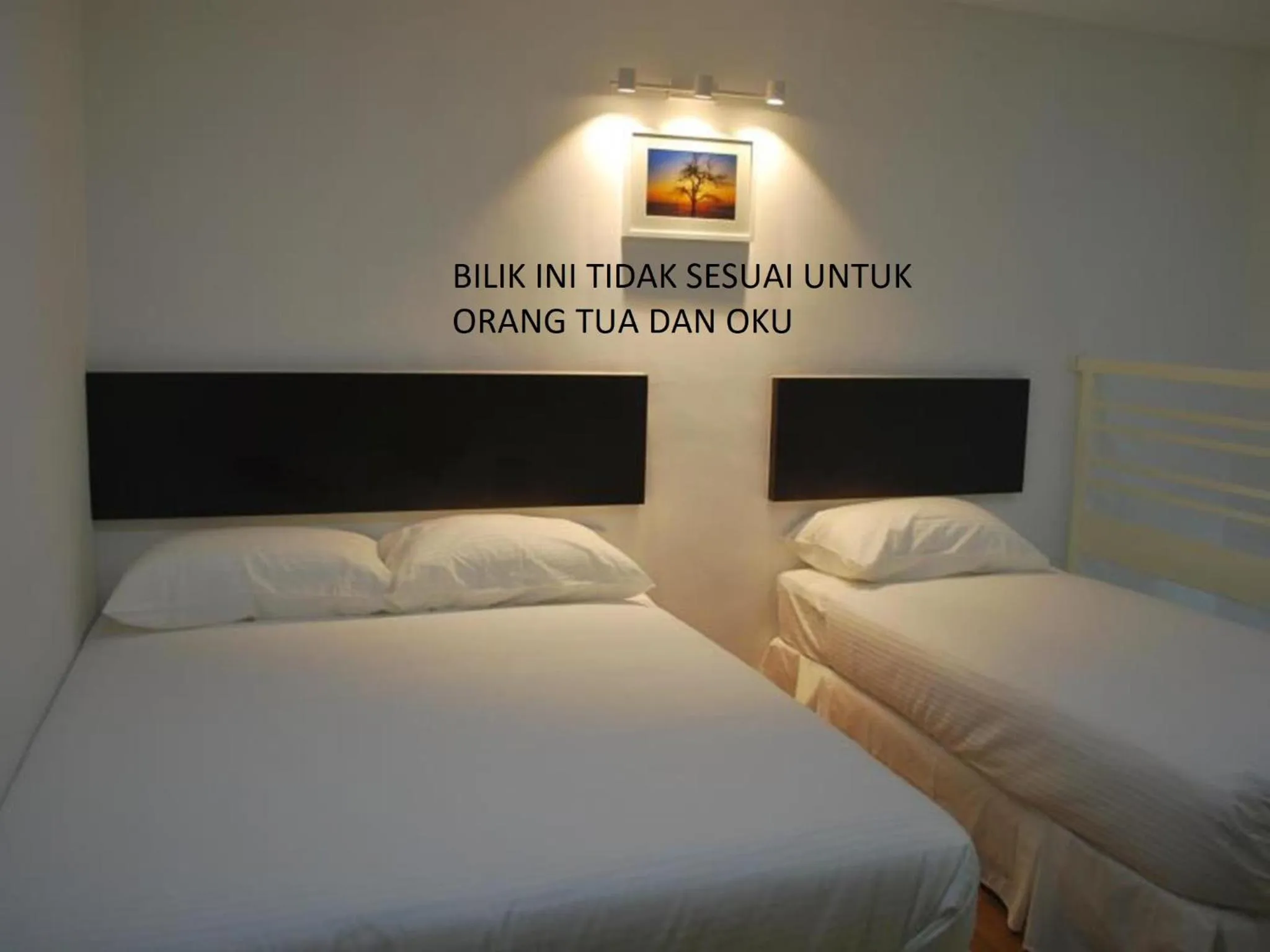 Bed in Apple Inn Hotel