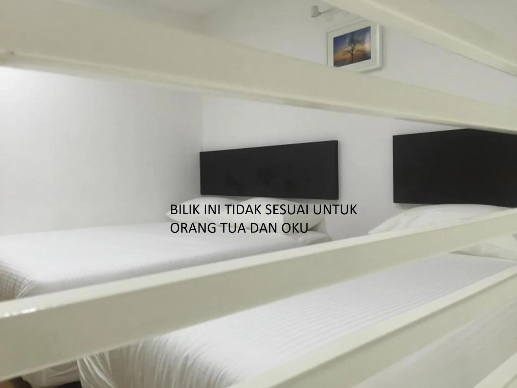 Bed in Apple Inn Hotel