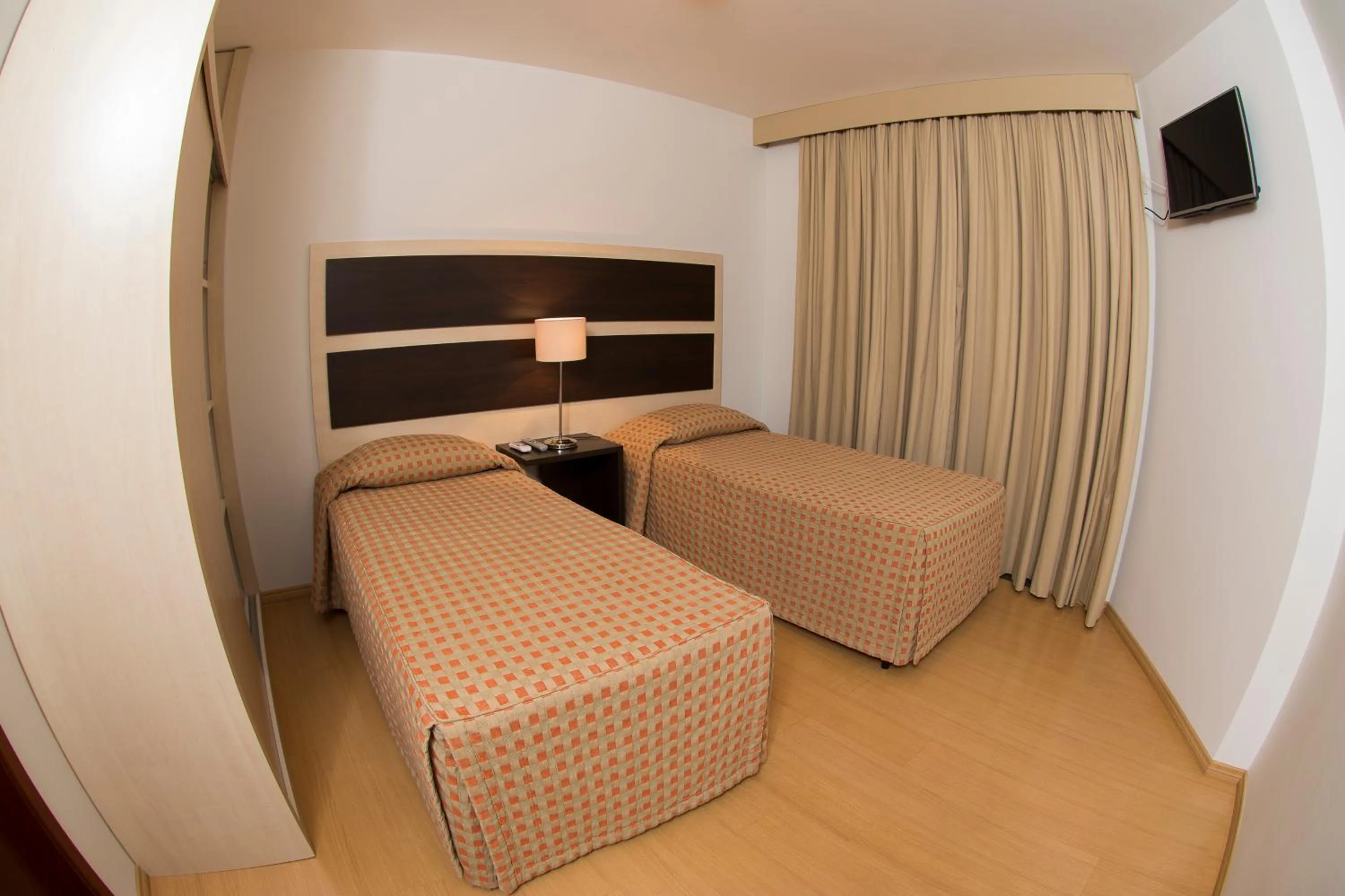 Bed in Lagoa Serena Flat Hotel