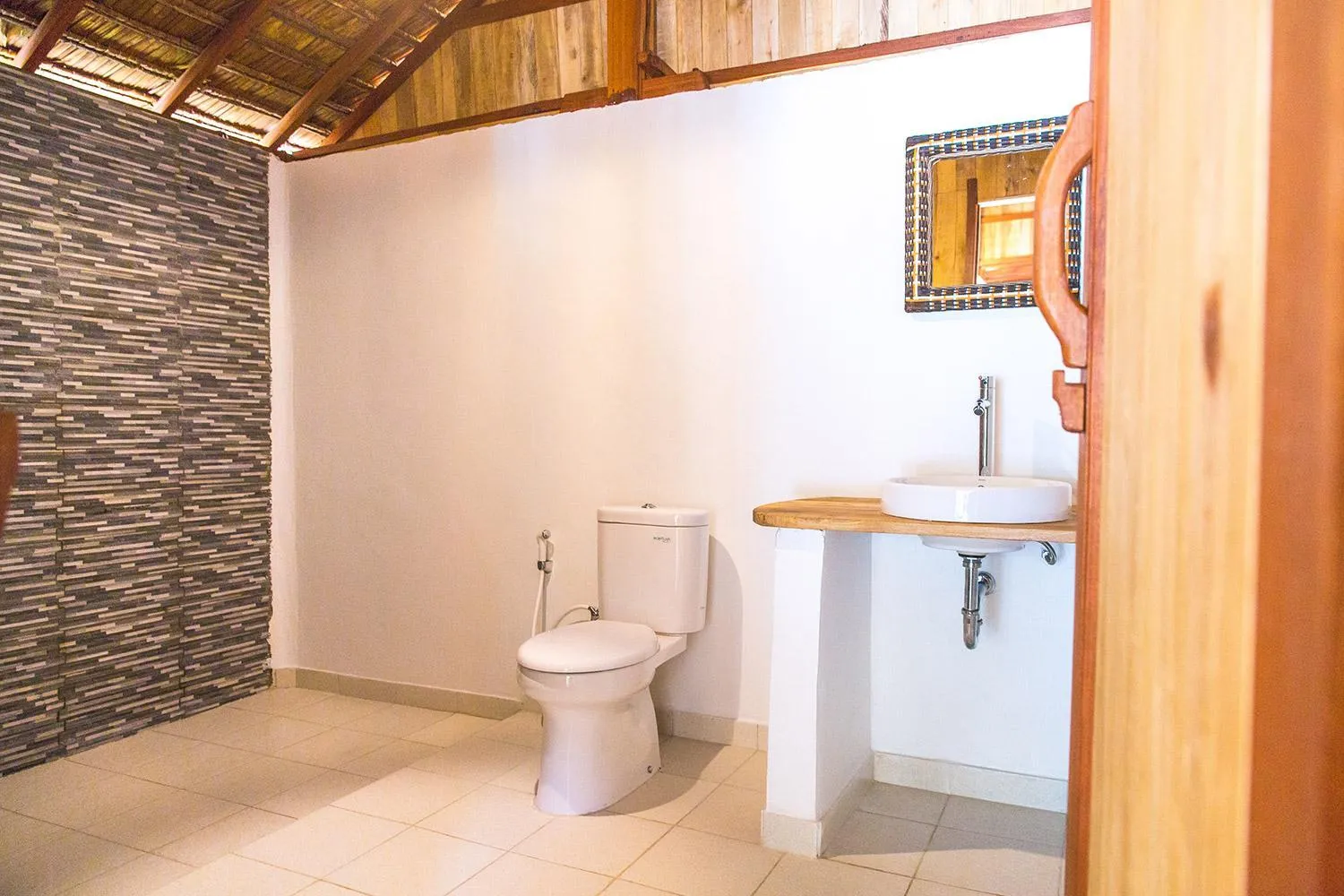 Toilet in BaraCoco Bungalows