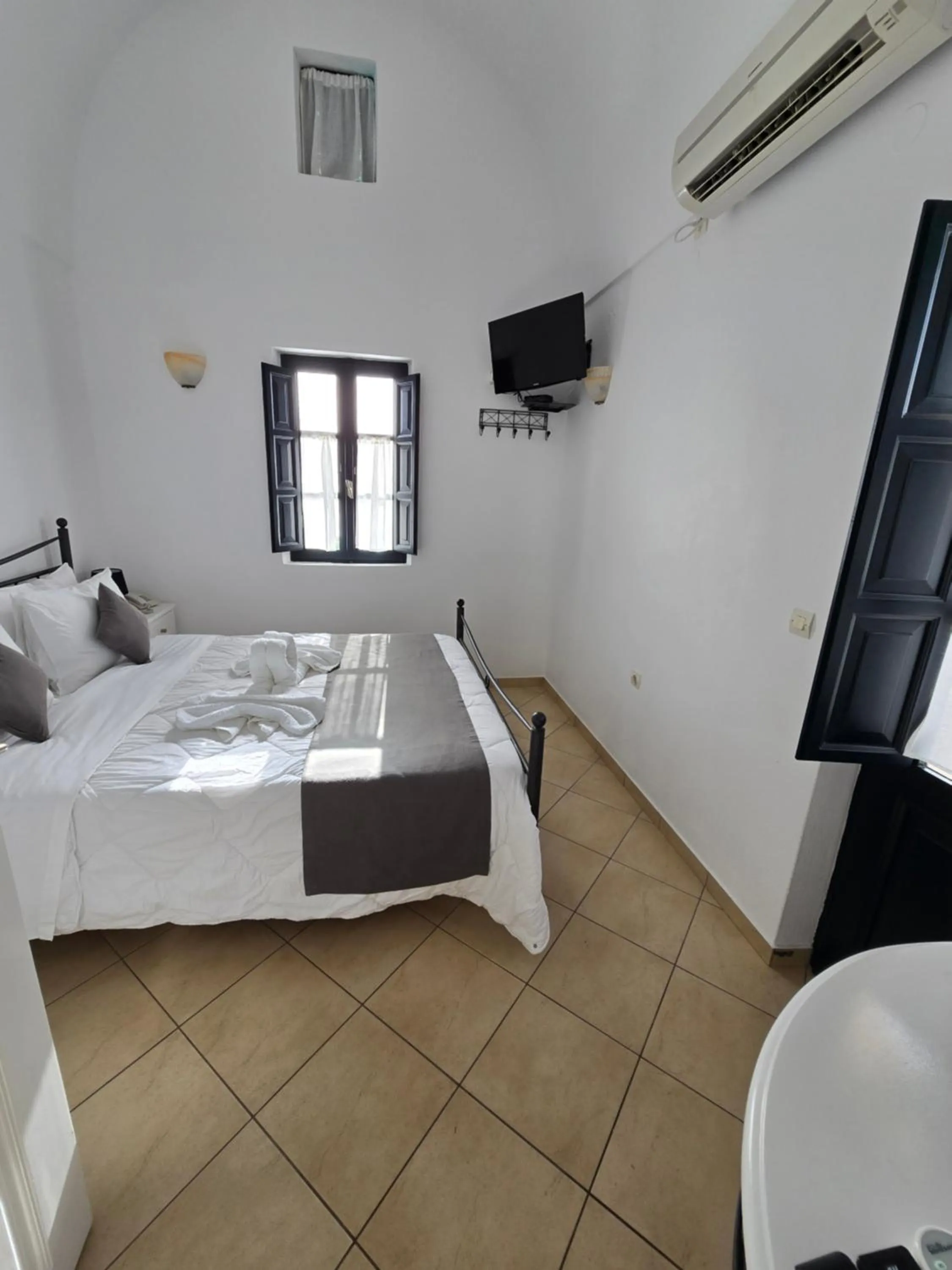 Bedroom in Anthonas Apartments