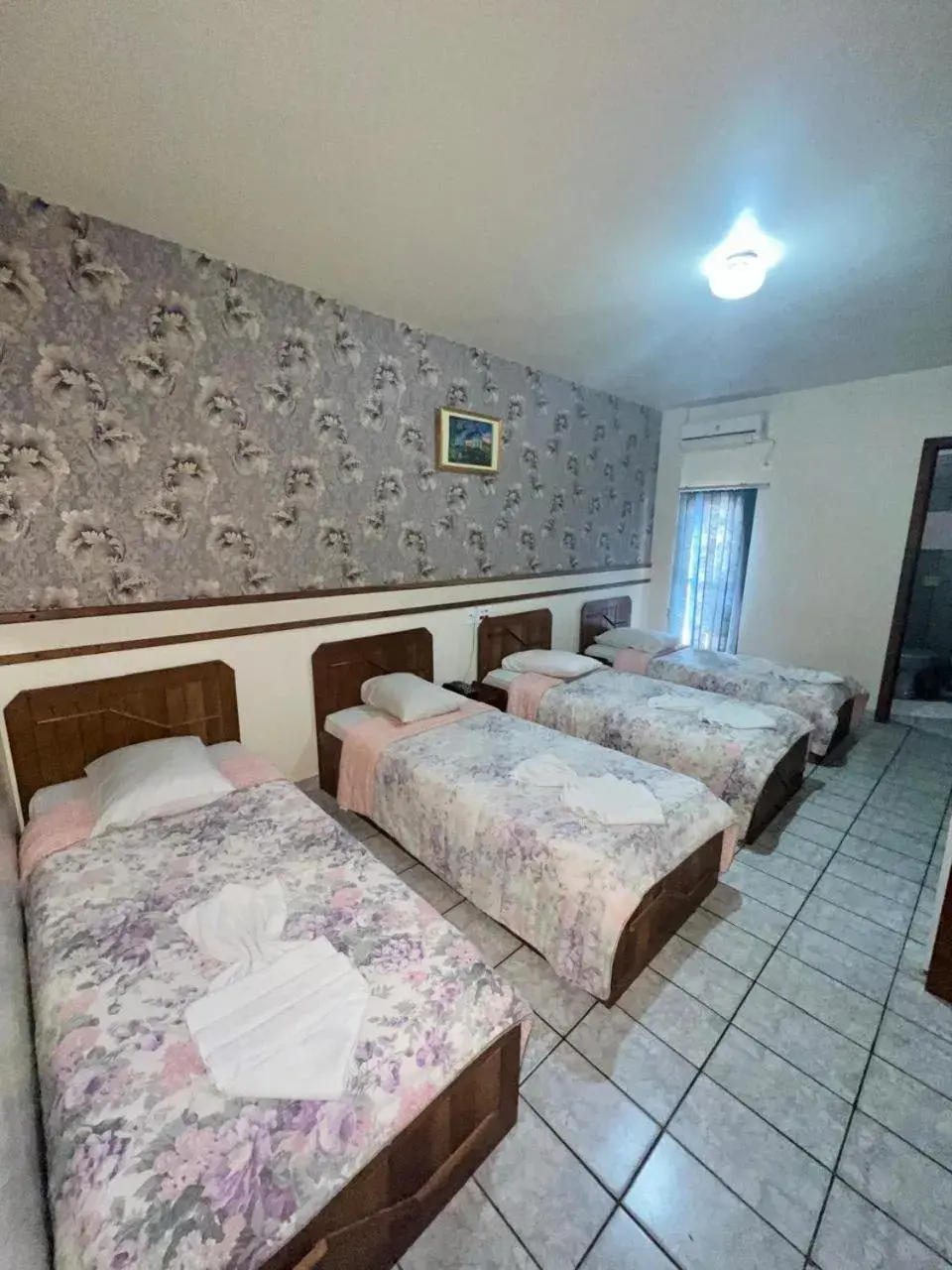 Quadruple Room in Tulipa Hotel Quadruple Room in Tulipa Hotel