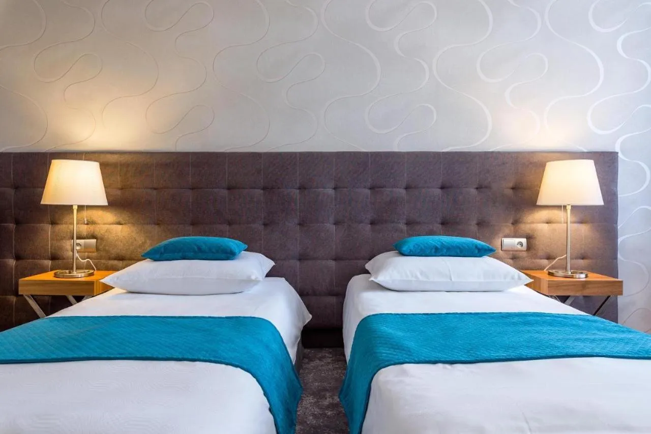 Bed in Tulip Hotels - Wroclaw Patio