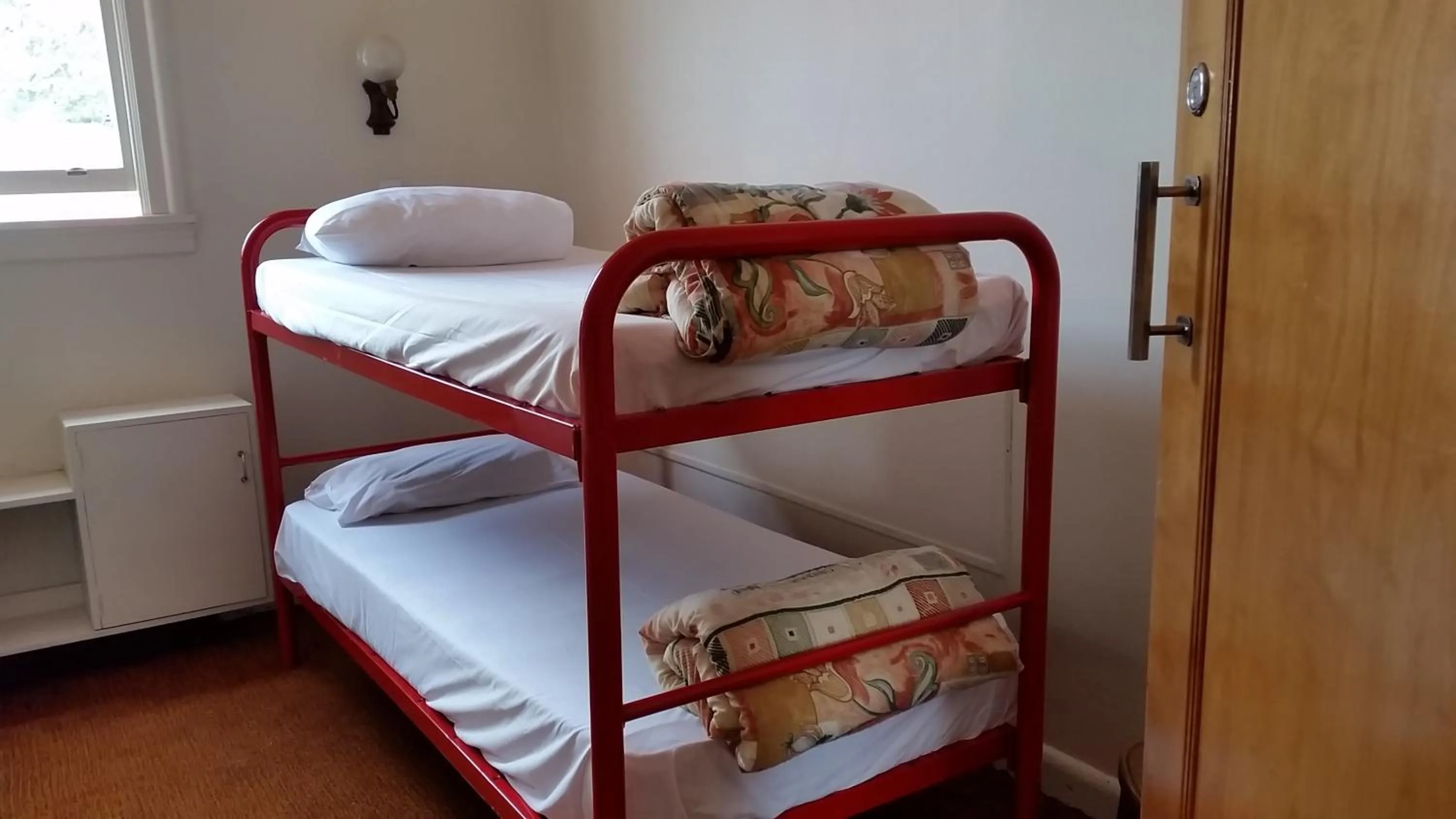 Bed in Whakatane Hotel
