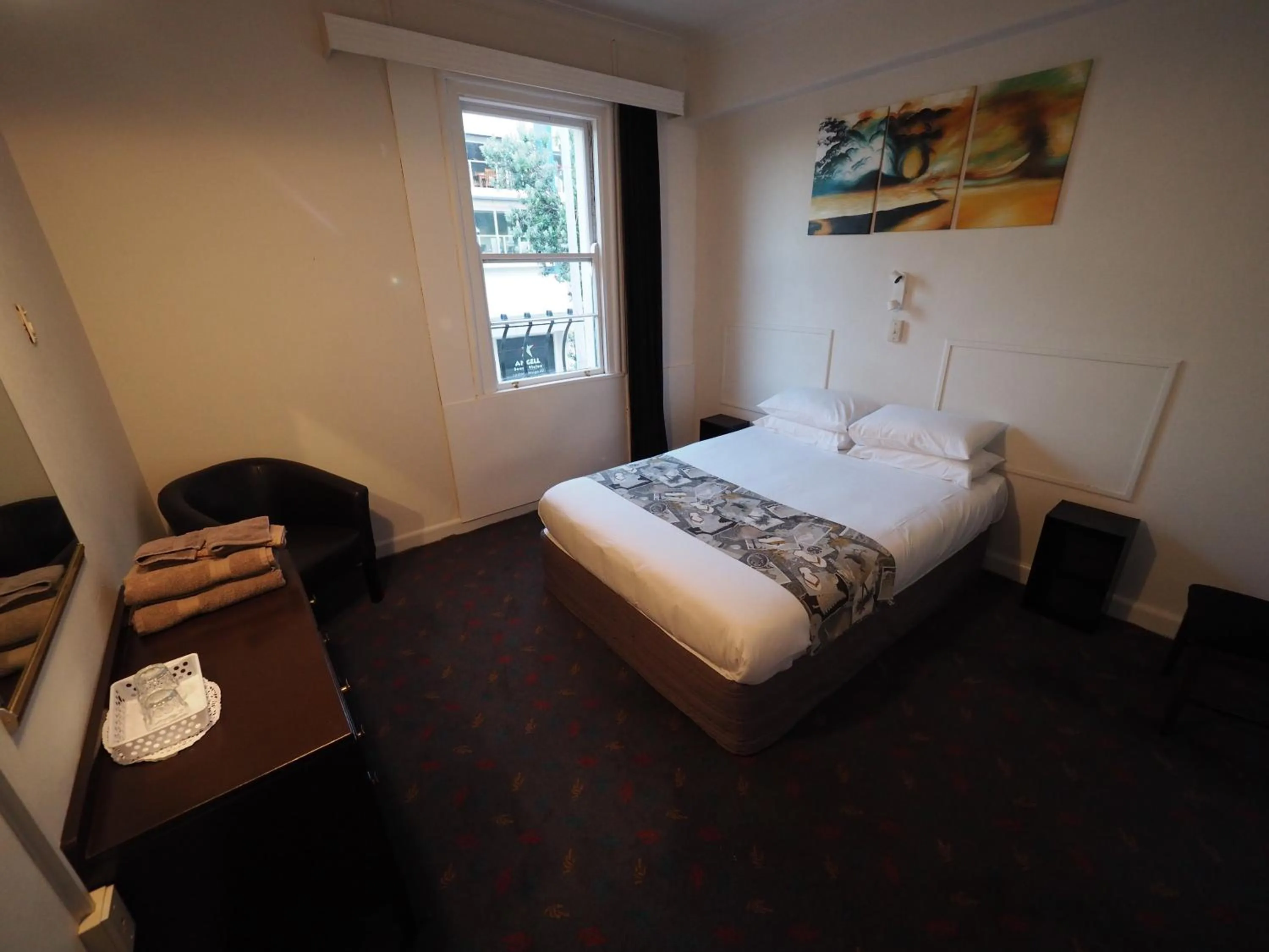 Bed in Whakatane Hotel