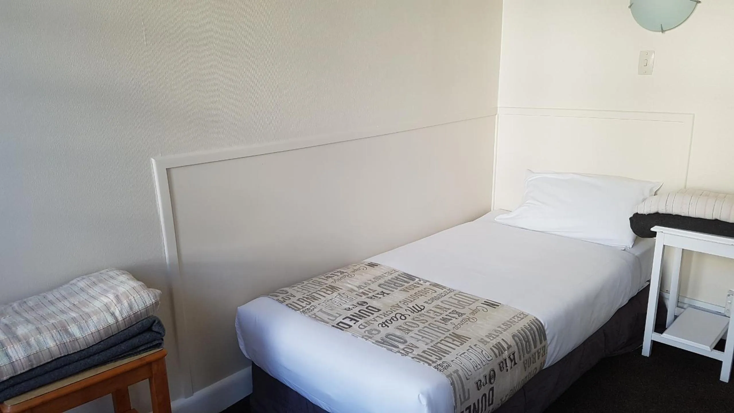 Bed in Whakatane Hotel