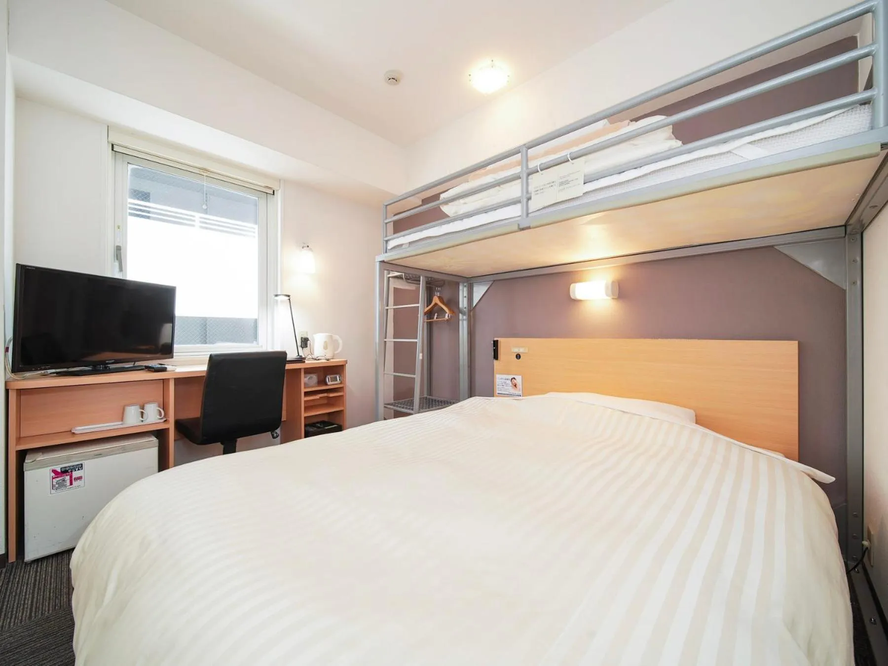 Bed in Super Hotel Kokuraeki Minamiguchi