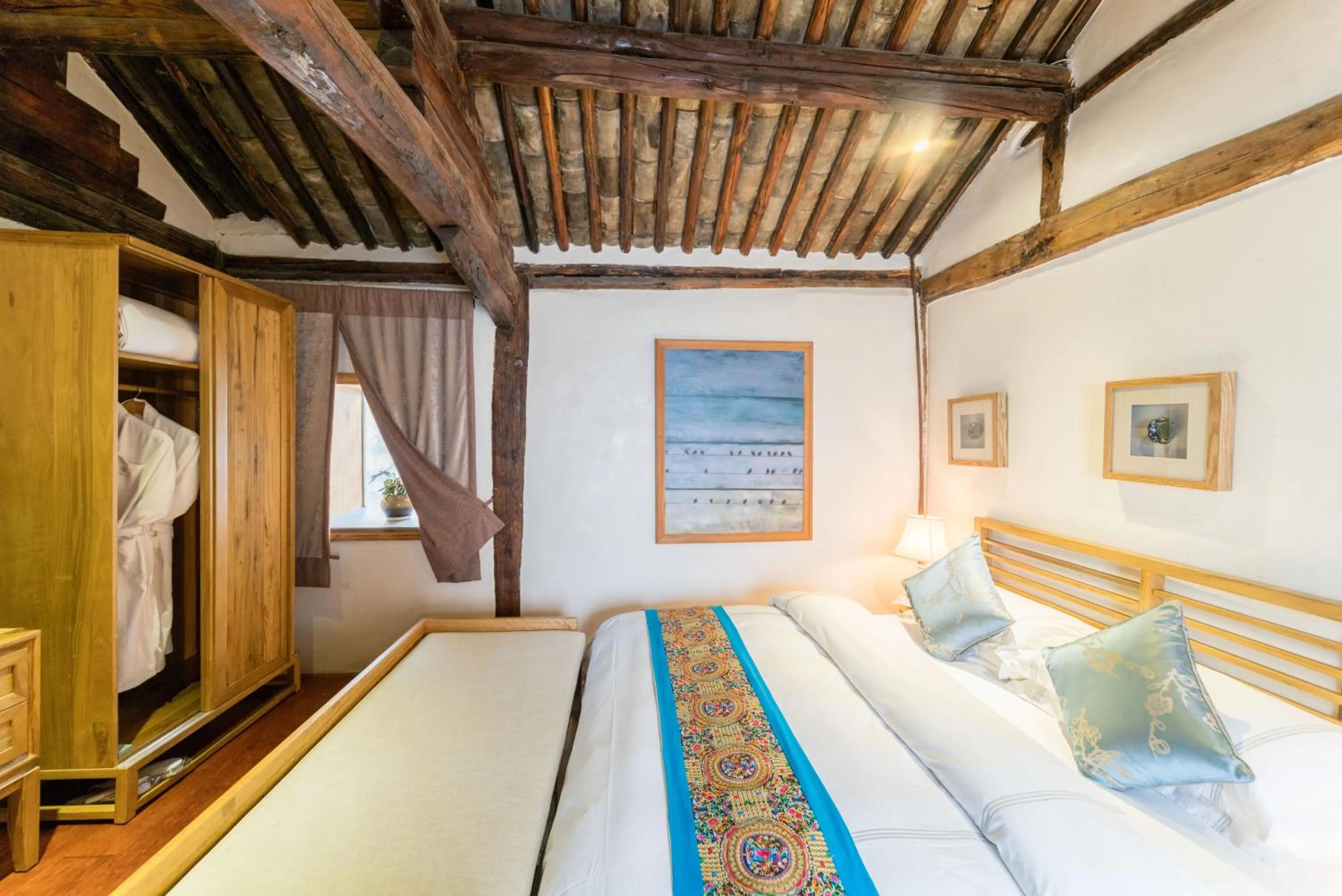 Bed in Dali Old Courtyard Boutique Inn