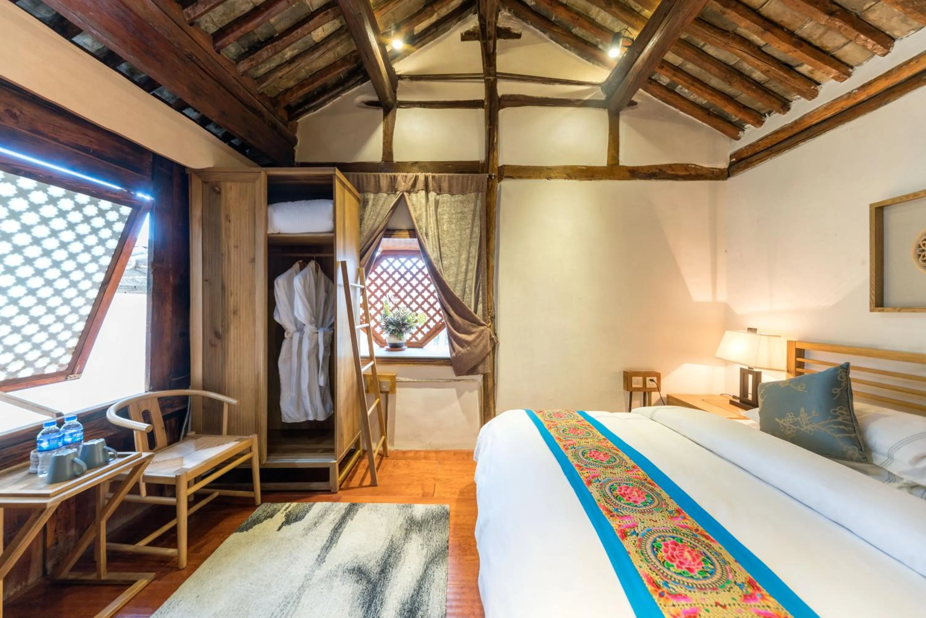 Bed in Dali Old Courtyard Boutique Inn