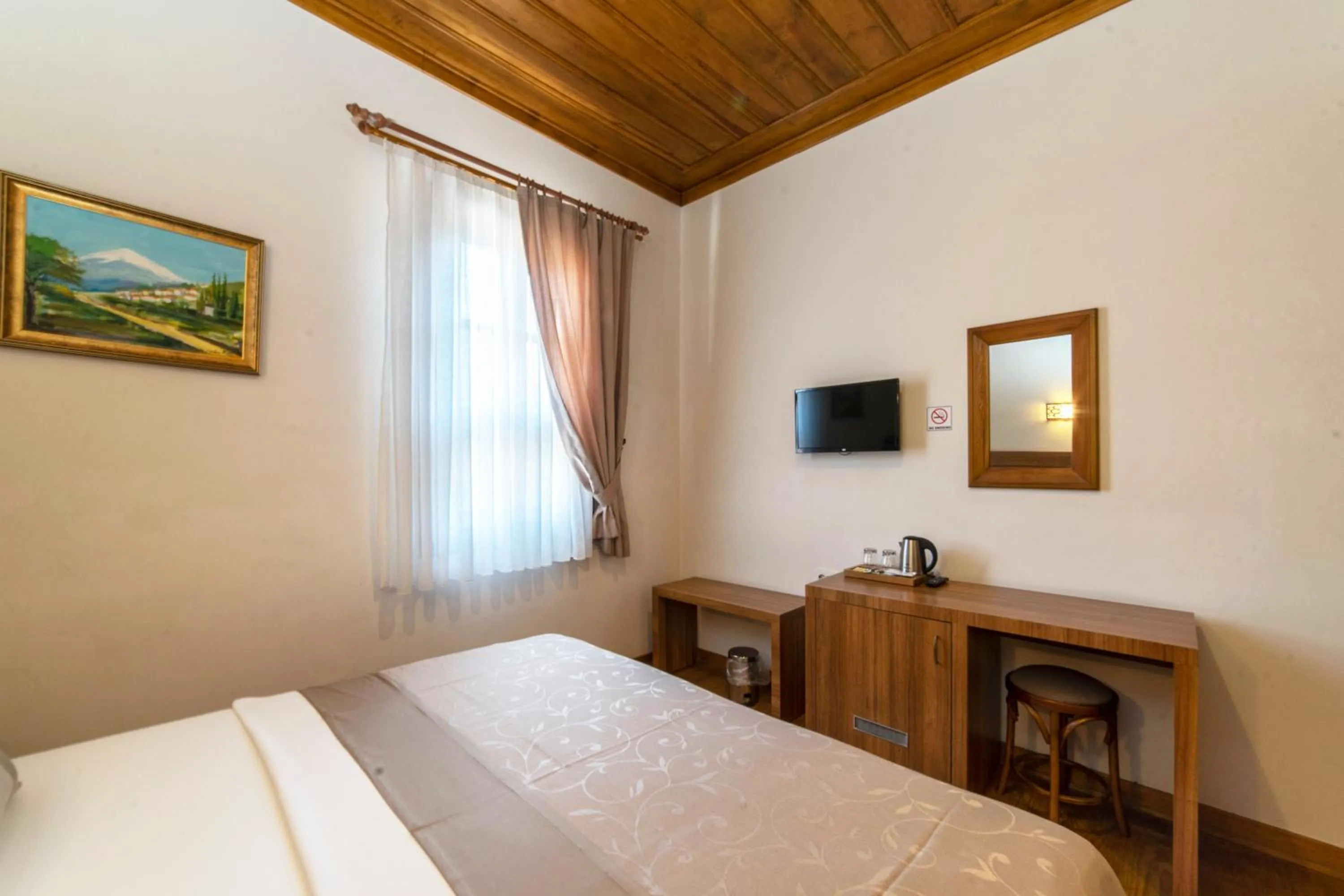 Bed in Armistis Hotel