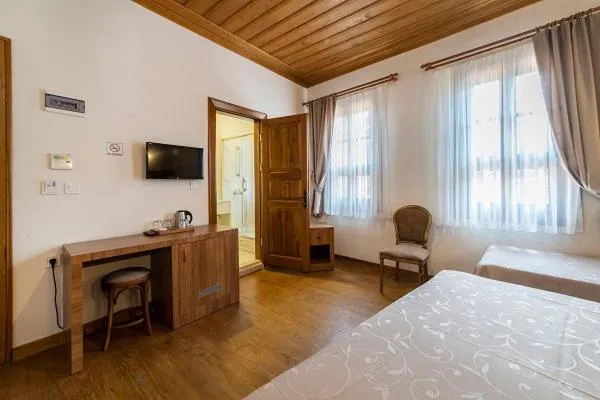 Bed in Armistis Hotel