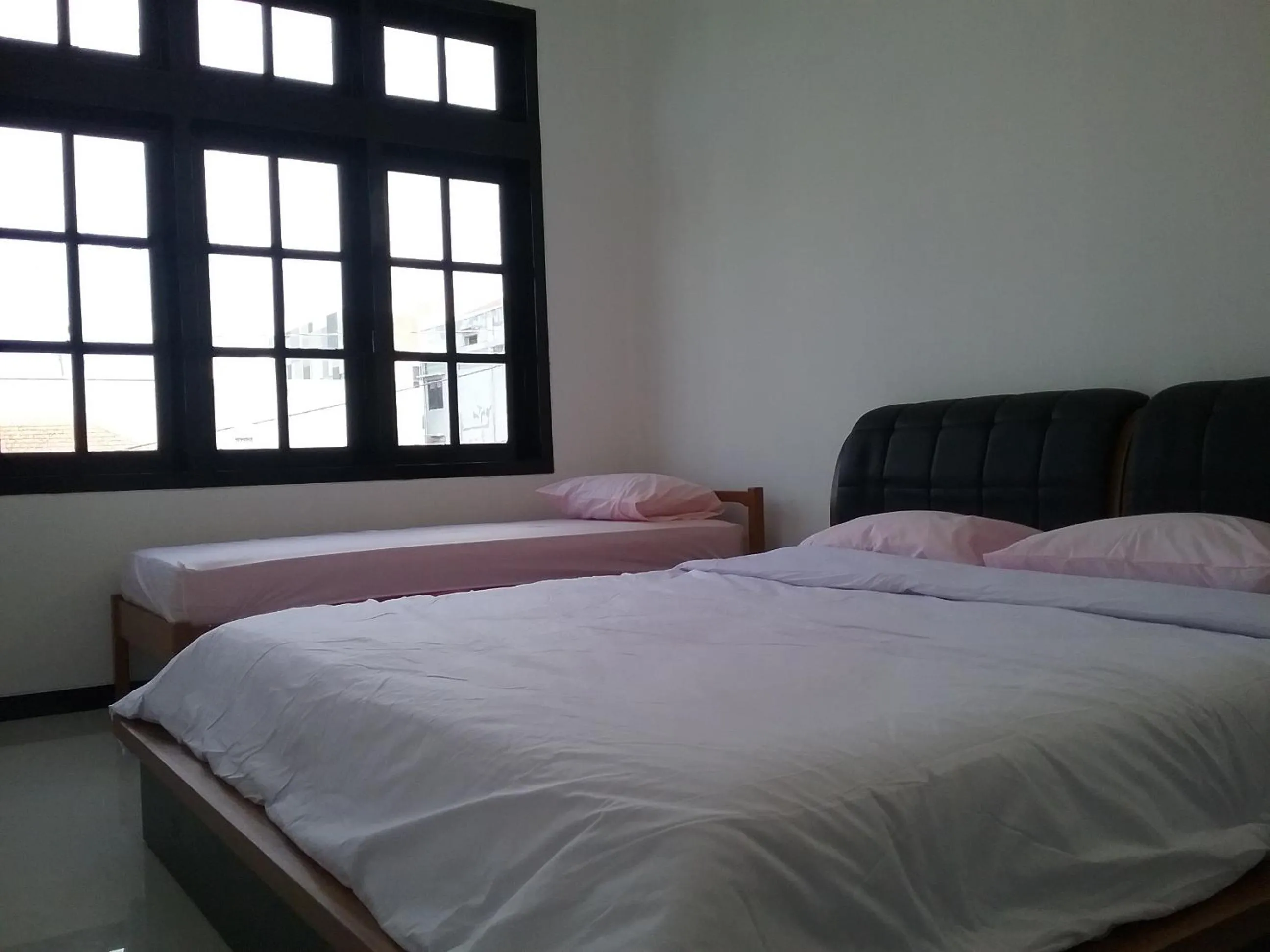 Bed in Mess Inn Semarang