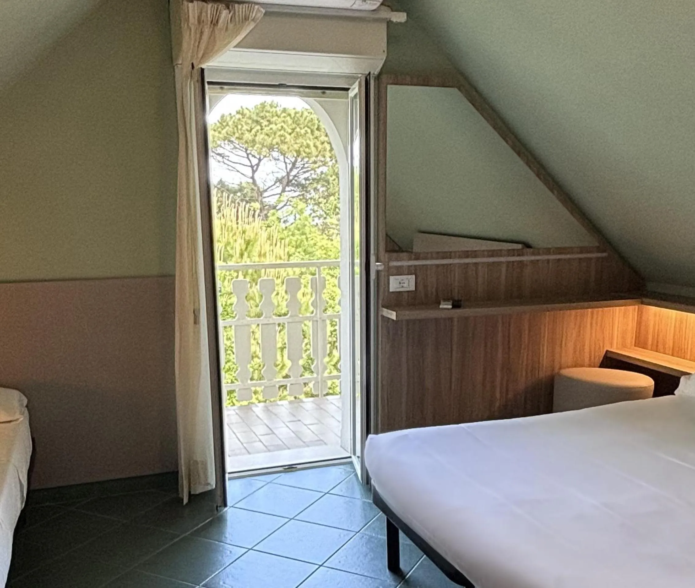 Bed in Pinetina Mare Baby Family Hotel