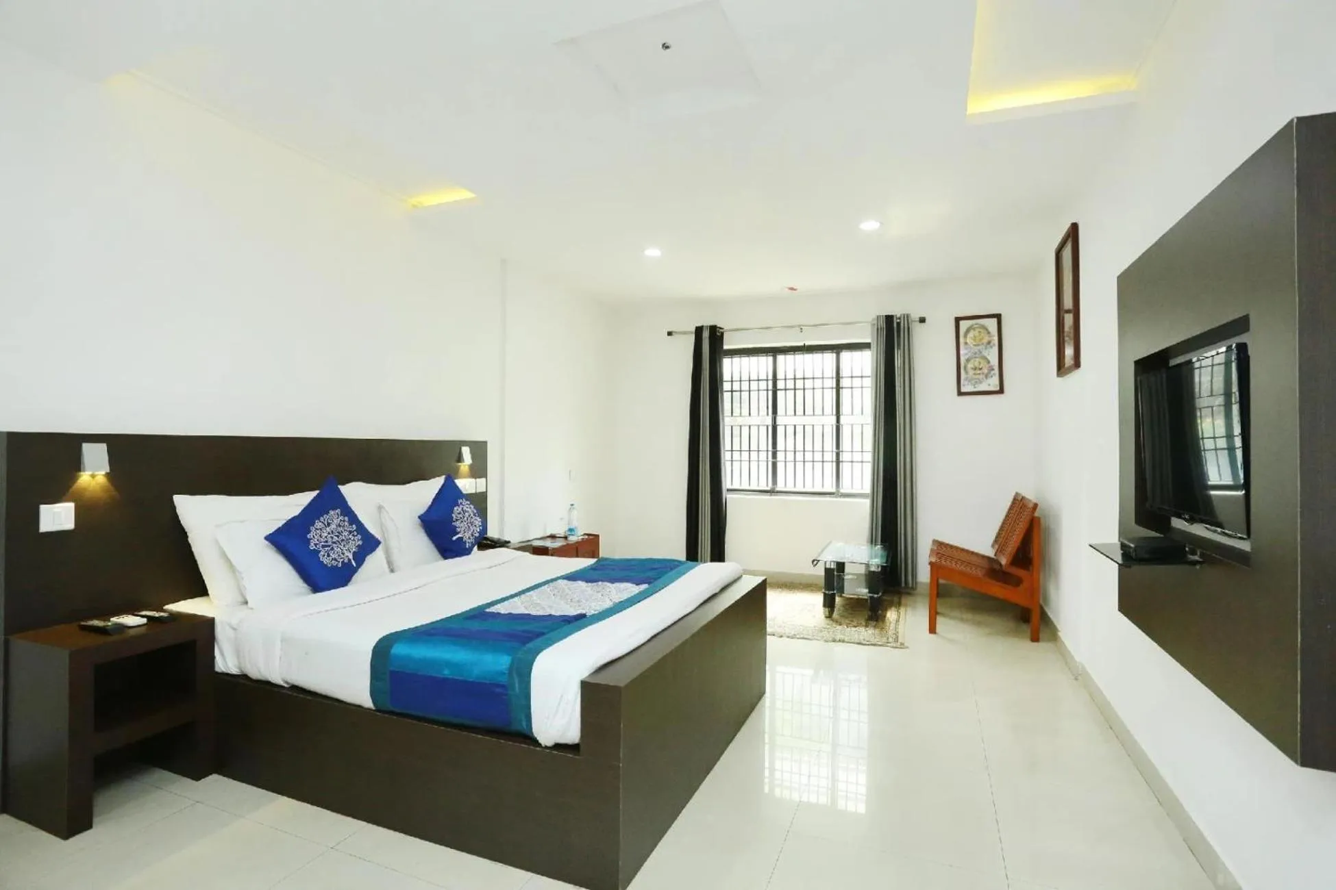 Bed in Half Moon Residency Calicut