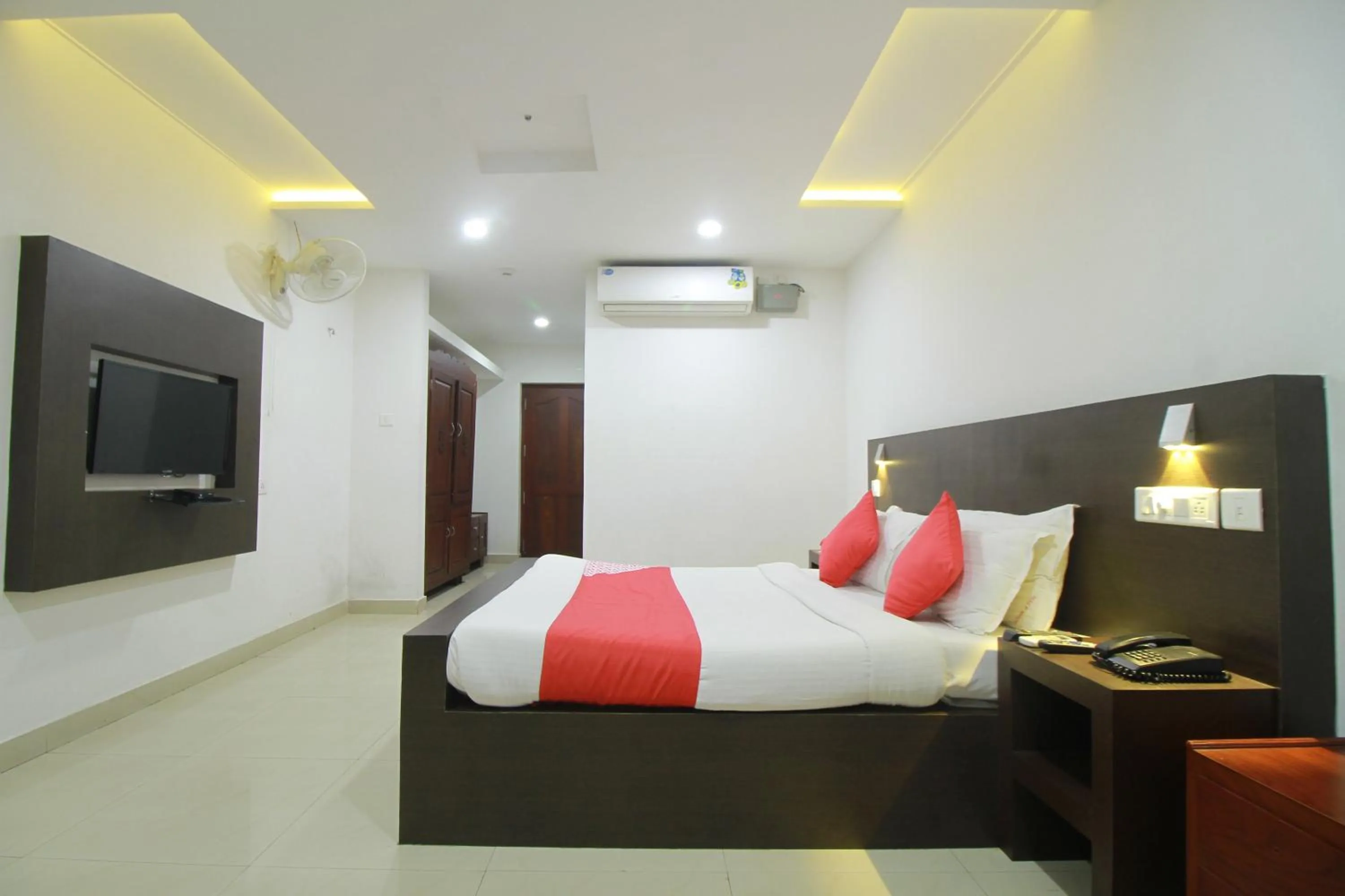 Bed in Half Moon Residency Calicut