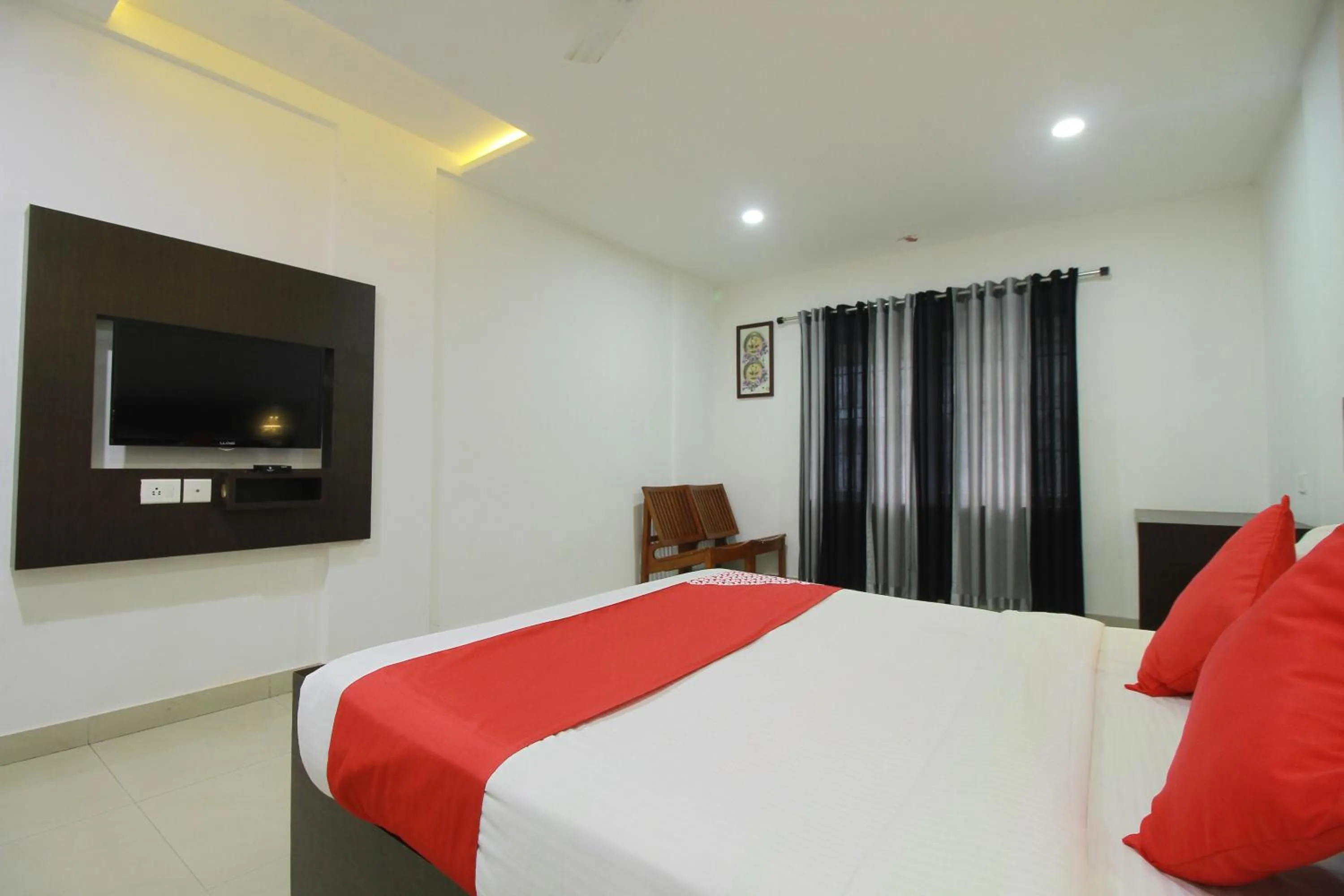 Bed in Half Moon Residency Calicut