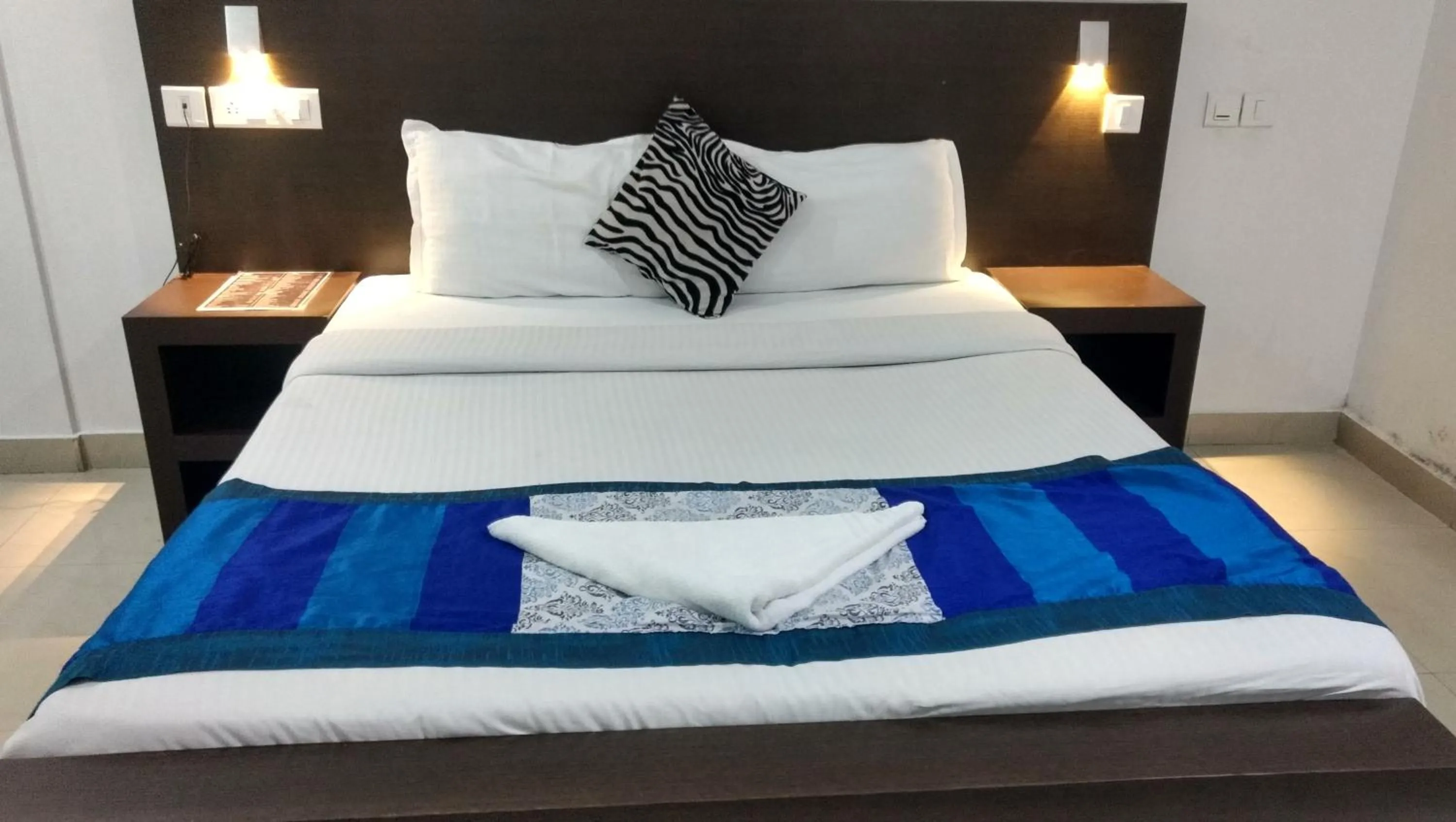 Bed in Half Moon Residency Calicut