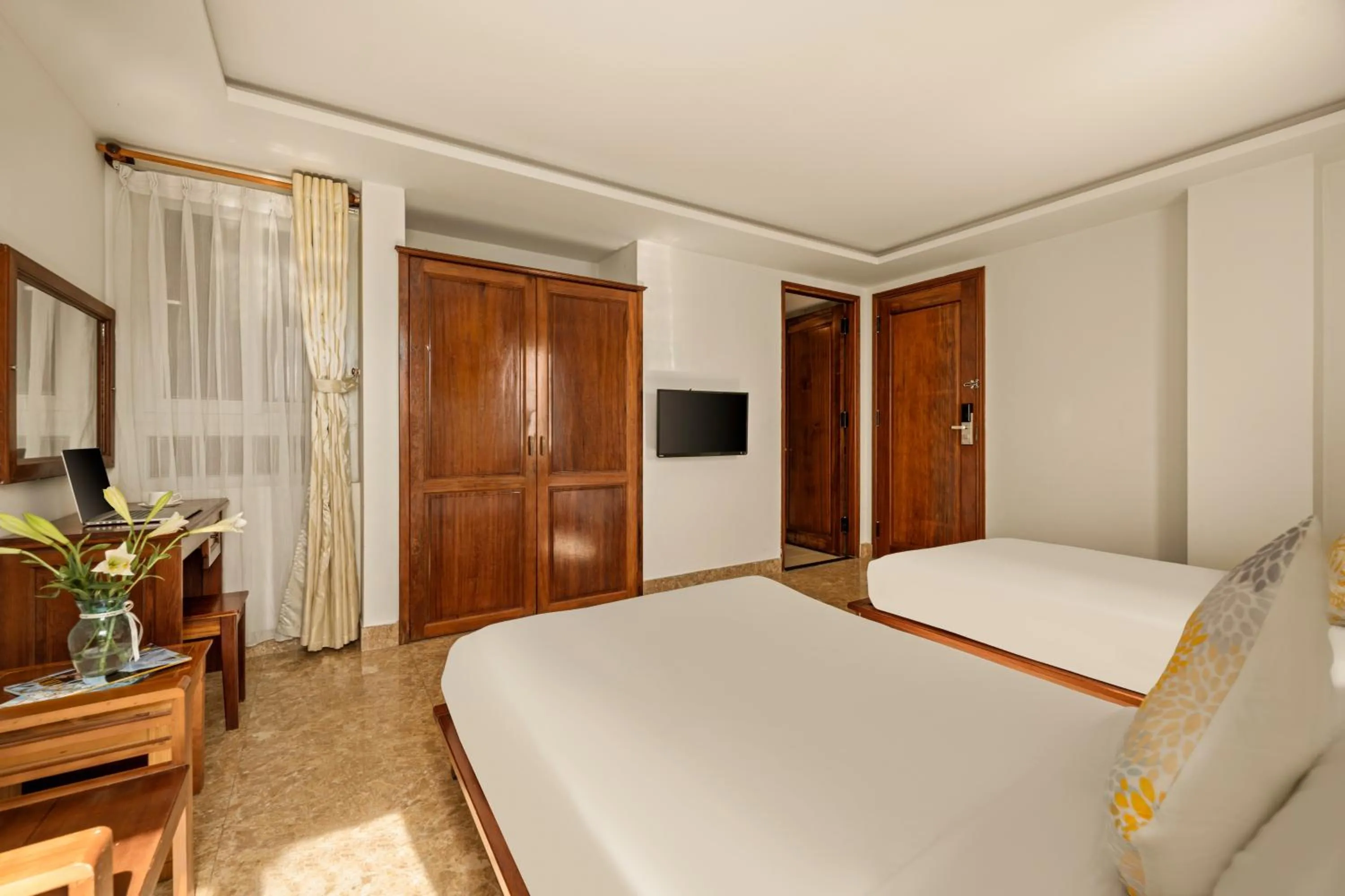 Bed in Titan Hotel Da Nang