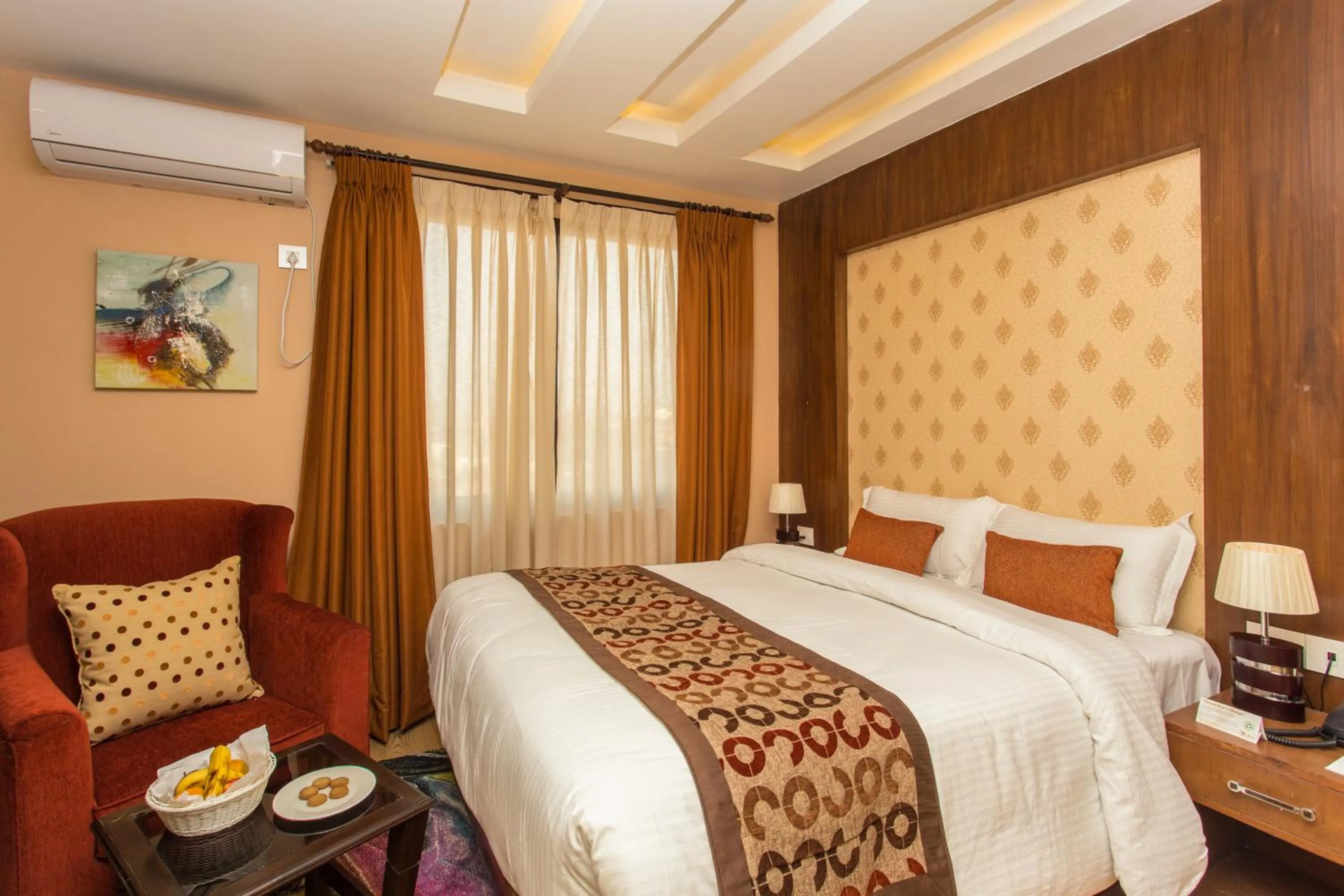 Bed in Yatri Suites and Spa