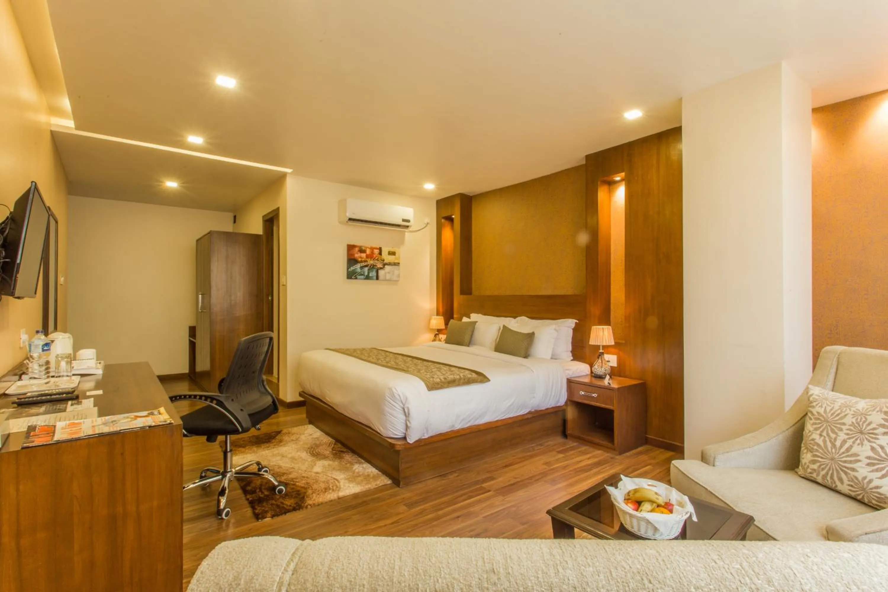 Bed in Yatri Suites and Spa
