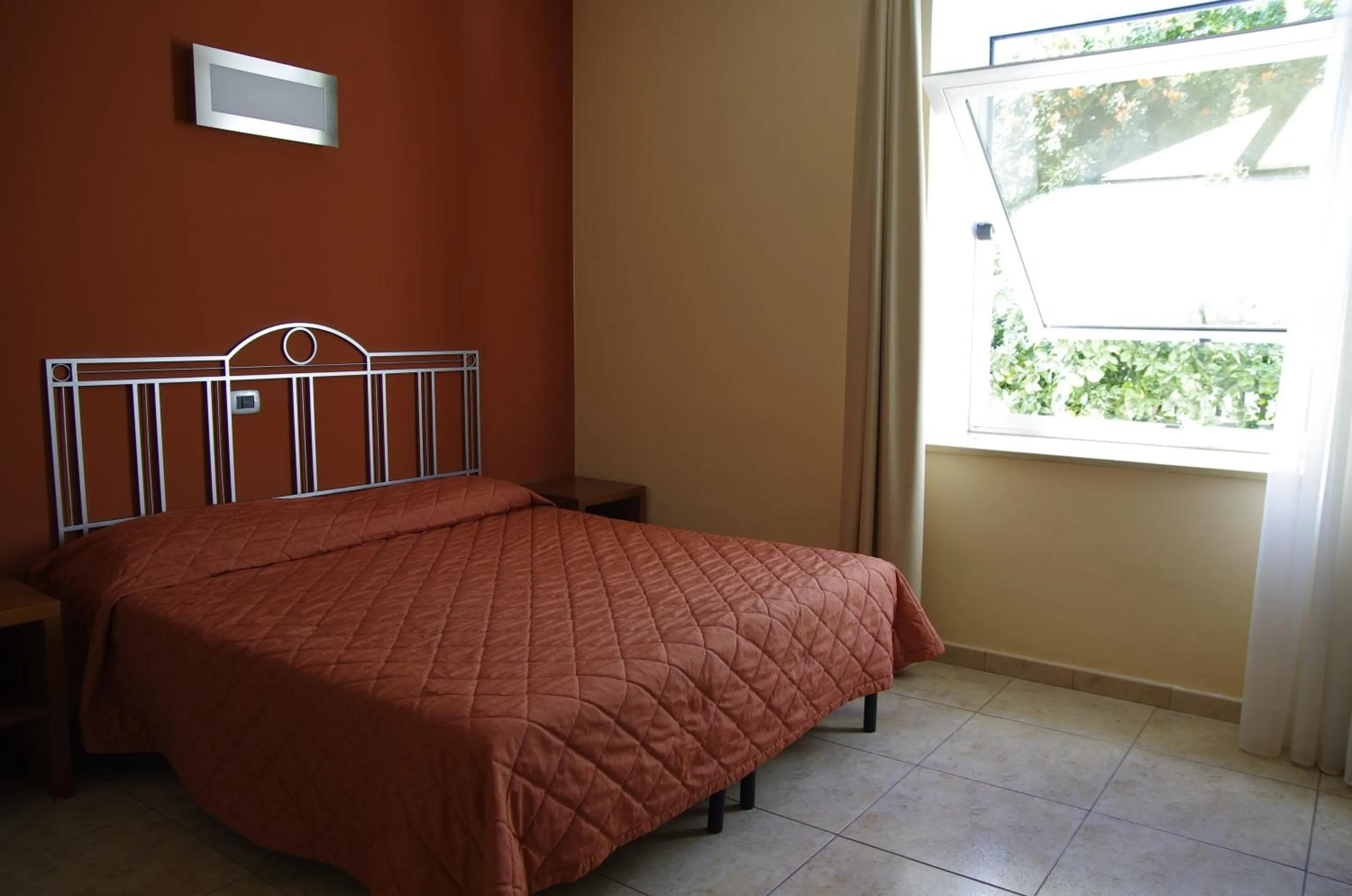 Bedroom in Hotel San Martino