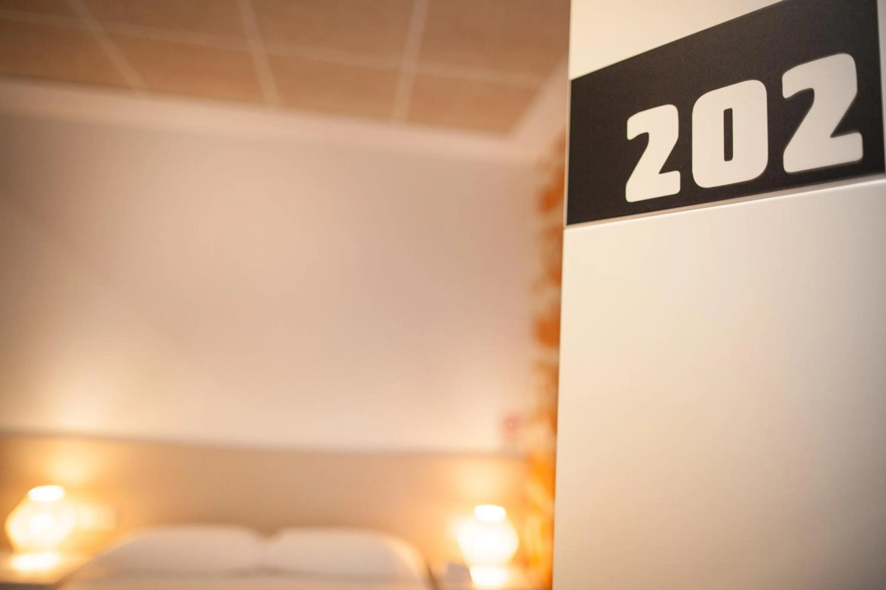 Property logo or sign, Bed in Host & Home