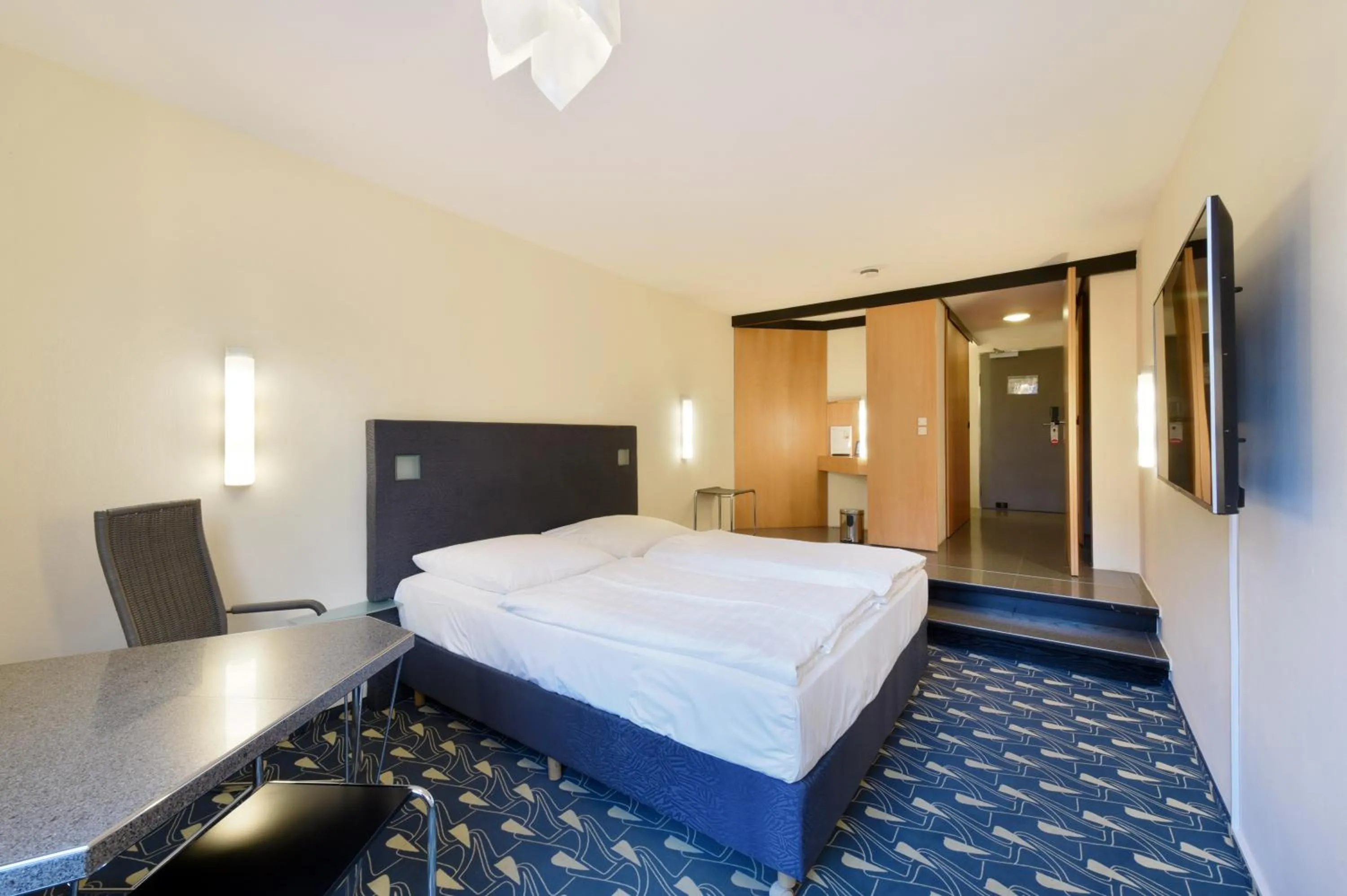 Photo of the whole room, Bed in Hotel Wiehberg - Self Check-In