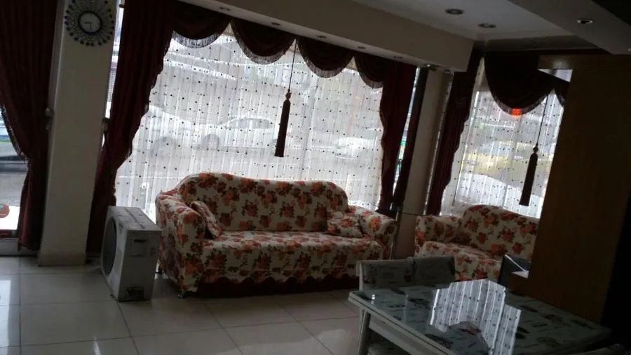 Communal lounge/ TV room in Can Hotel