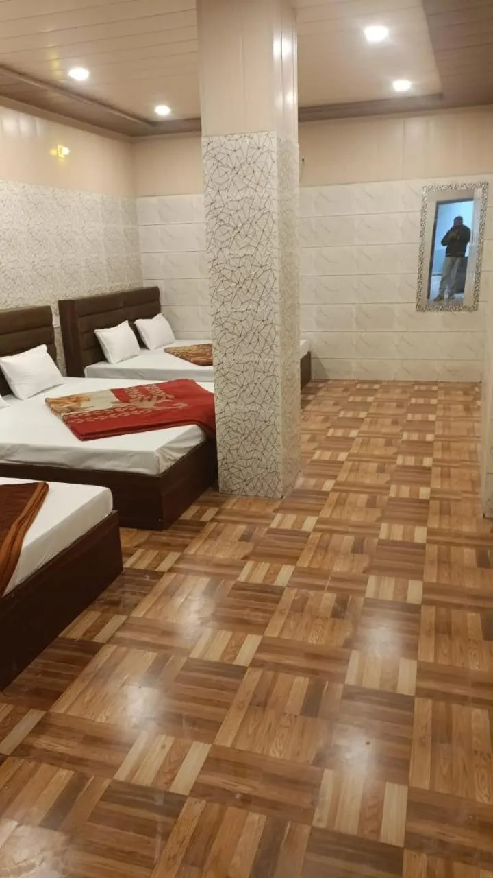 Bed in Asha Guest House